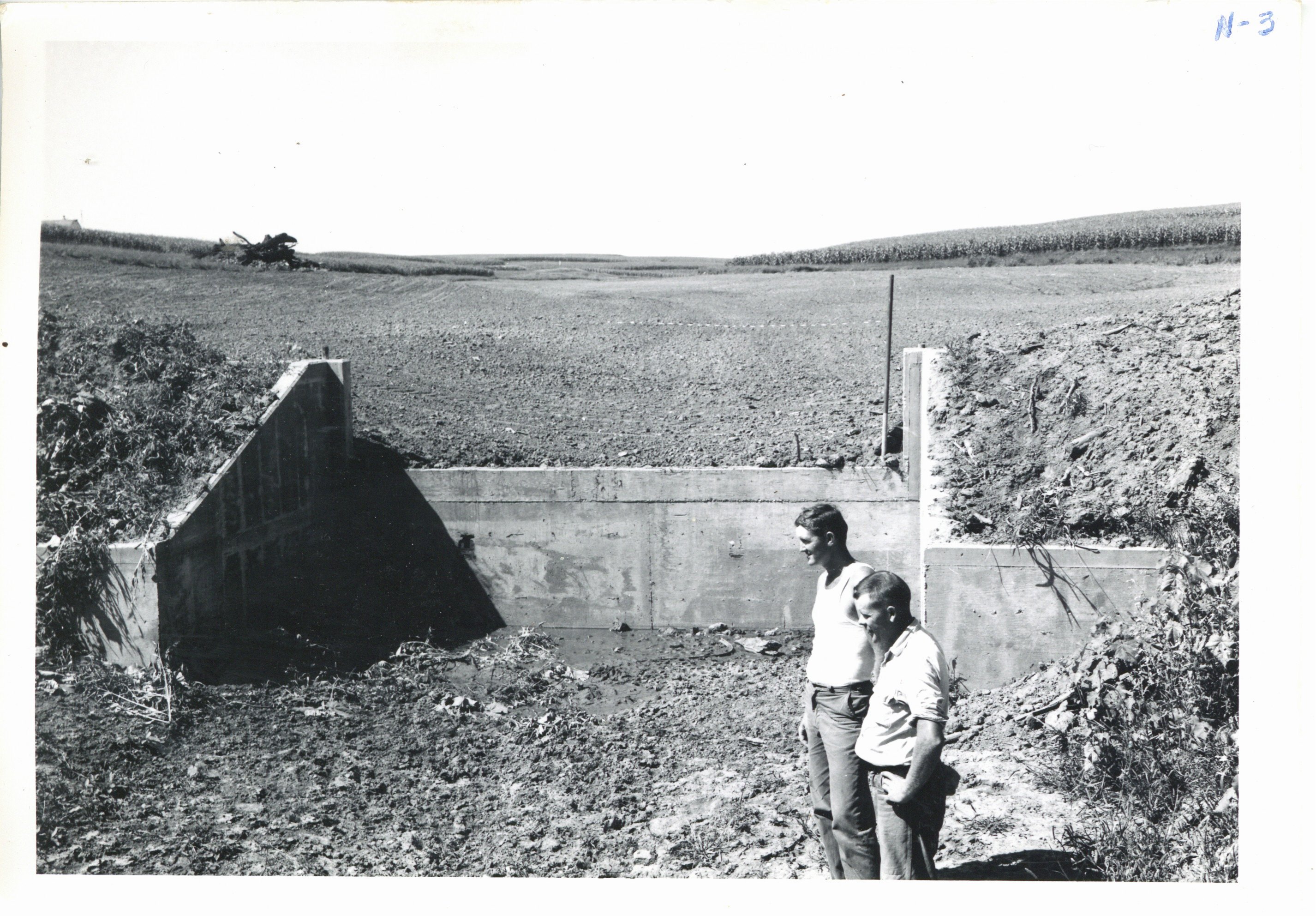 Drop spillway dam on property line of Paul Hansen and Chas Meyers