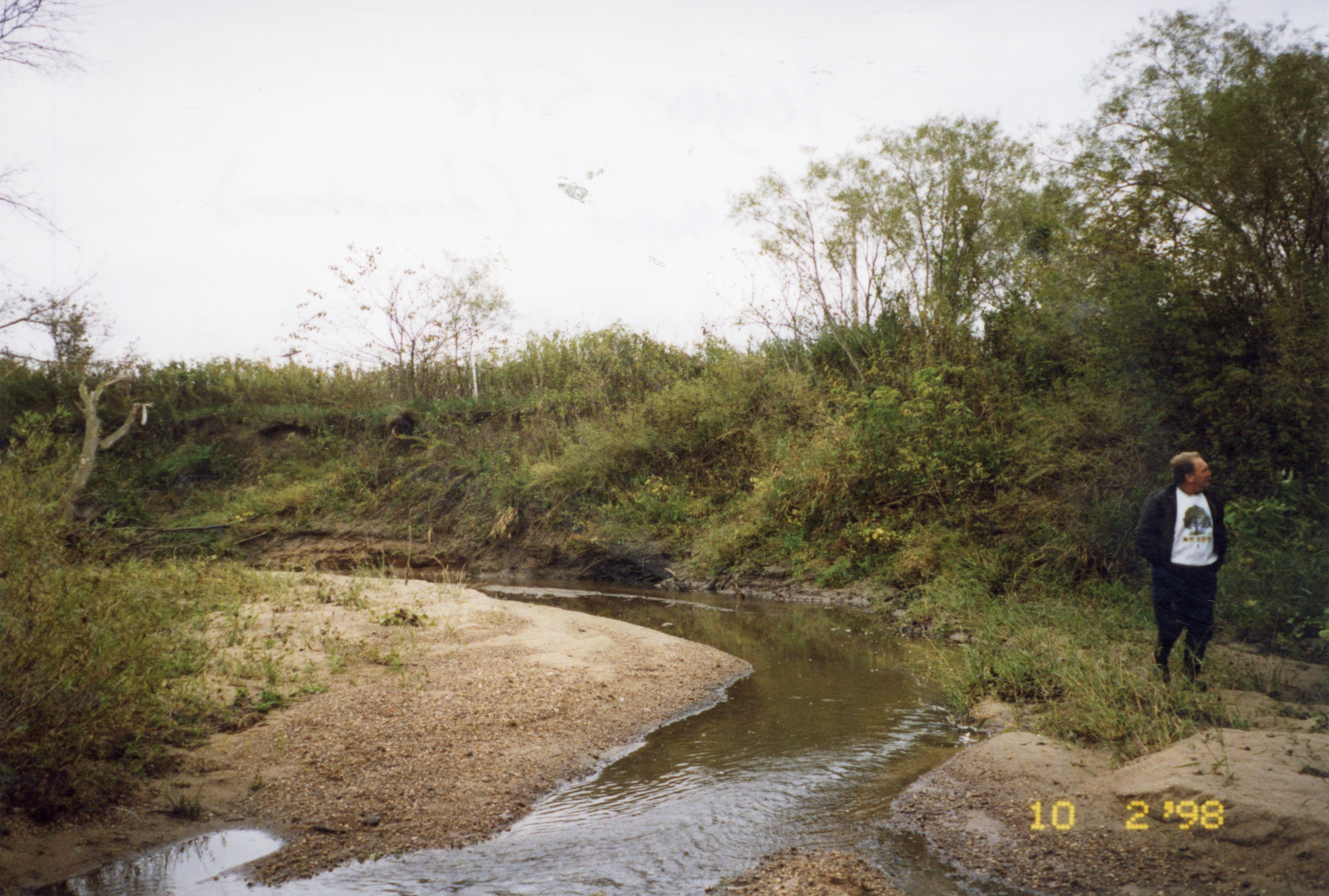 1998 Roger Hunt from Trees Forever  walks along riverbank<br />
