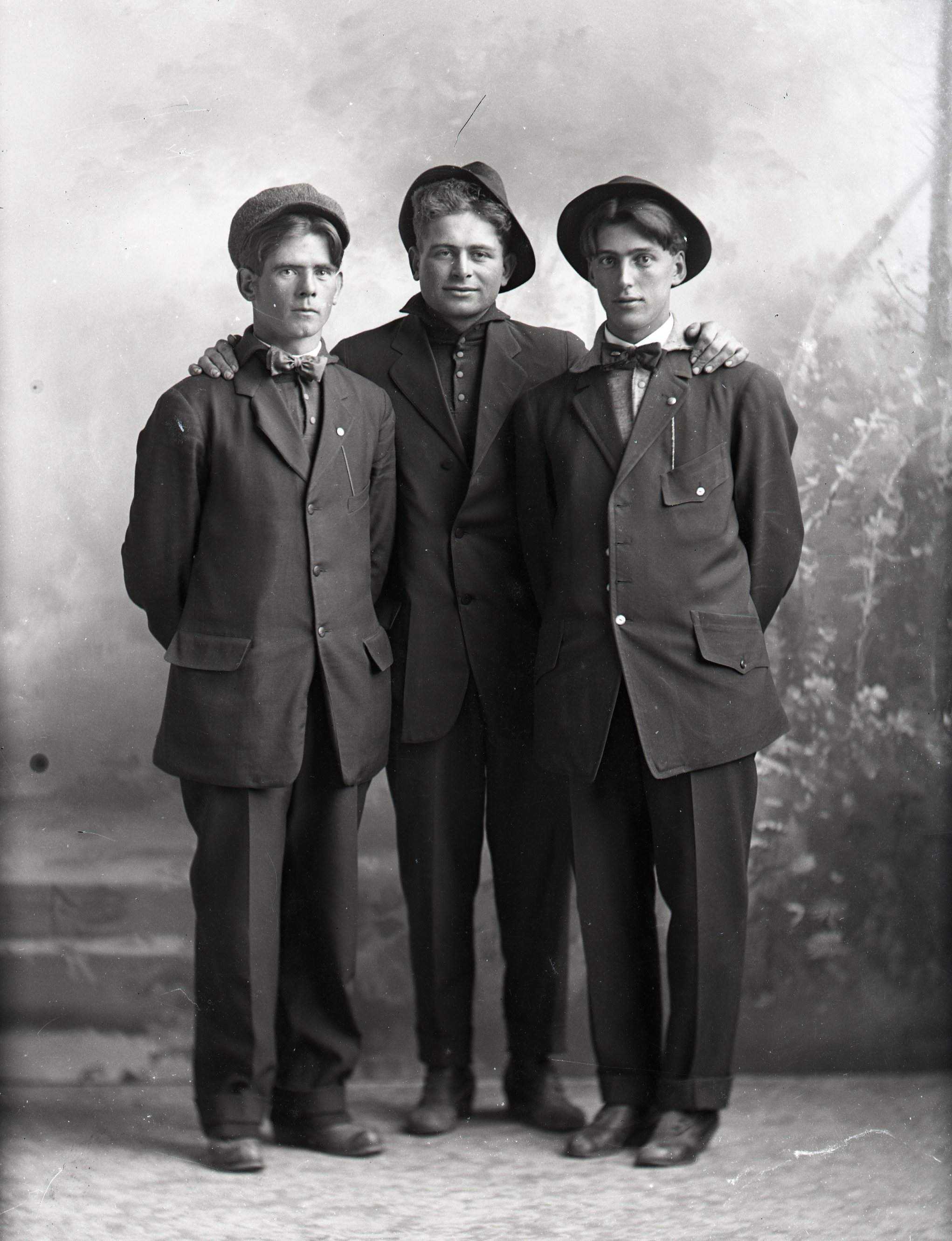 Three men in hats