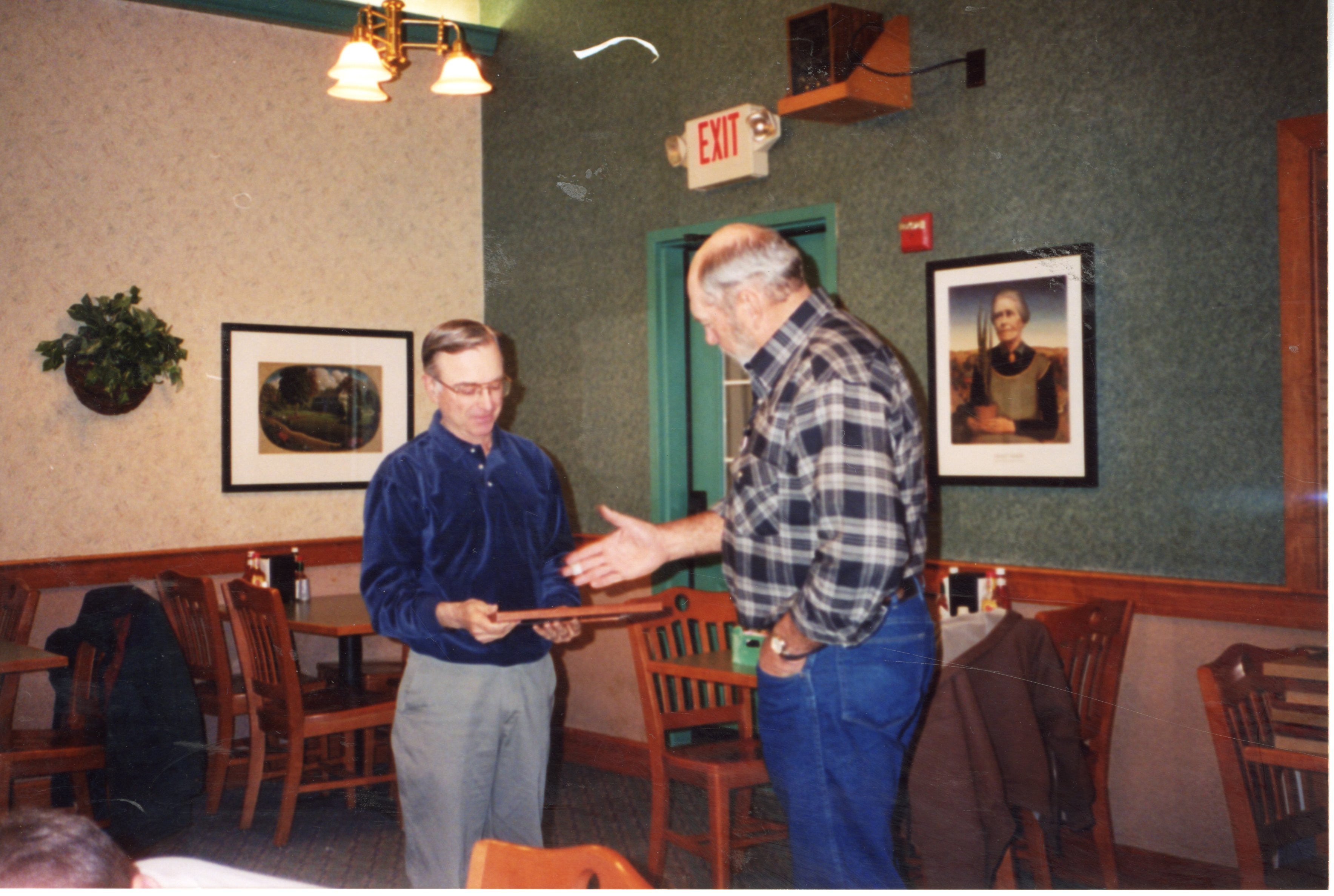 2003  Iowa Soil Conservation Awards Program (ISCAP) owner/operator winner Bill Walker receives his award from Chairperson Don Lounsbury 