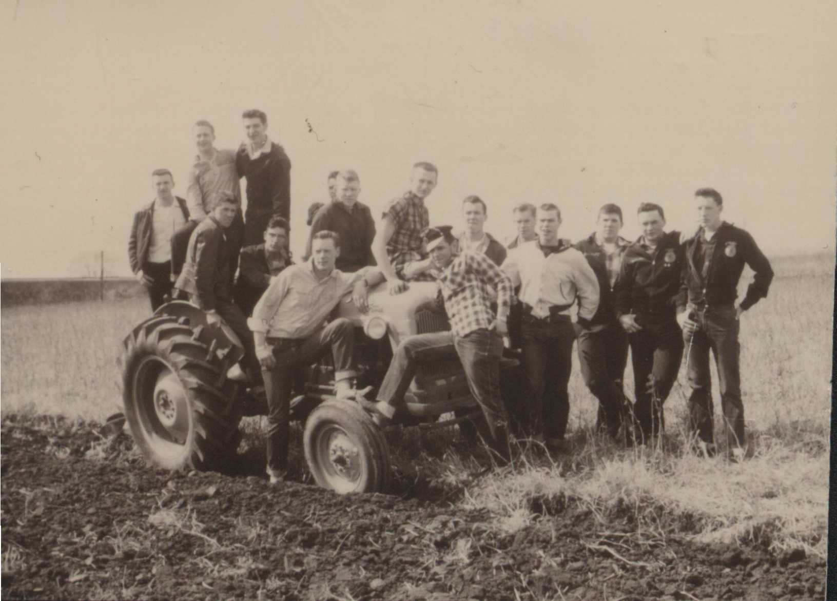 Future Farmers of America posing with tractor