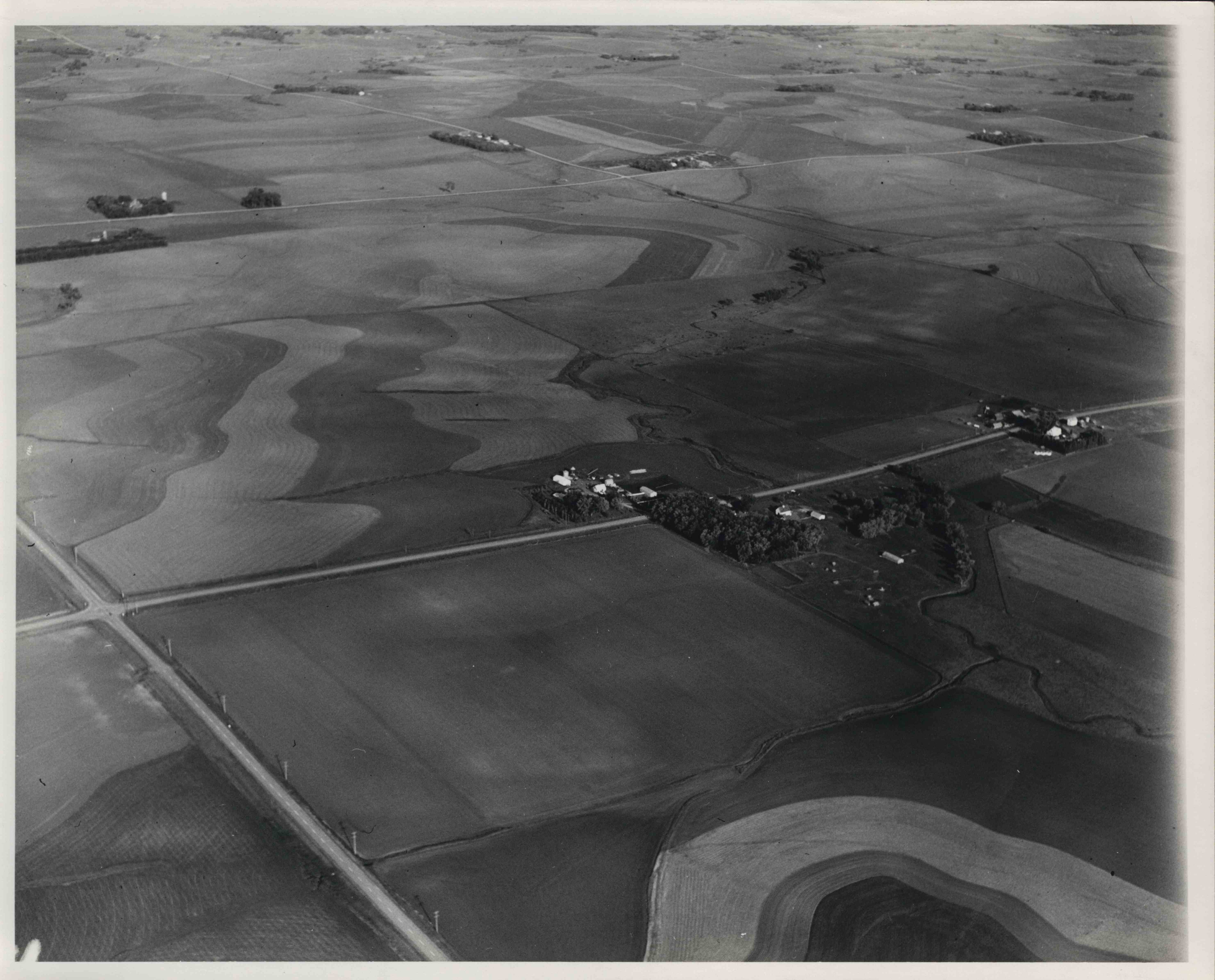 Contoured farmland with farms