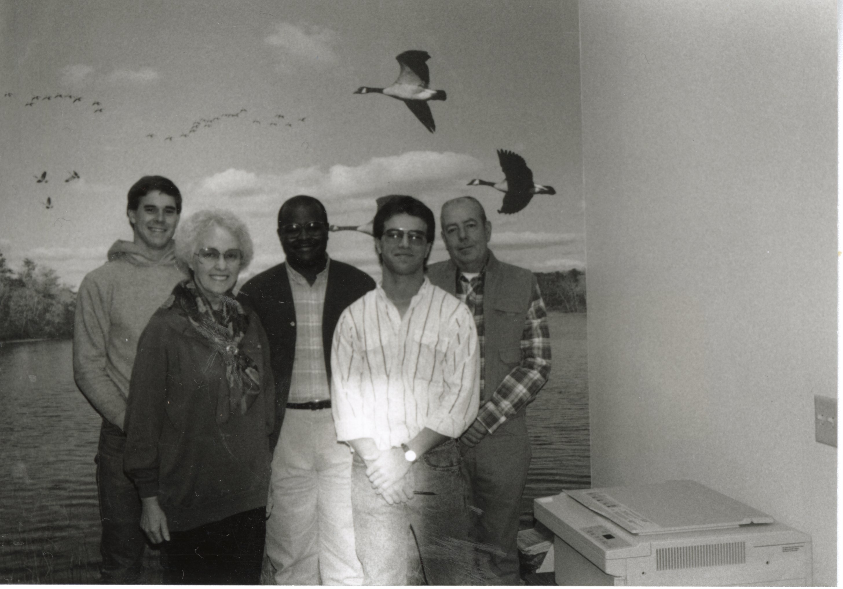 1991  Des Moines County Soil and Water Conservation District employees include front row: Doug Ensminger and Dorothy Davis. In the back row are John Fruehling, Terry Cosby, and John Horan