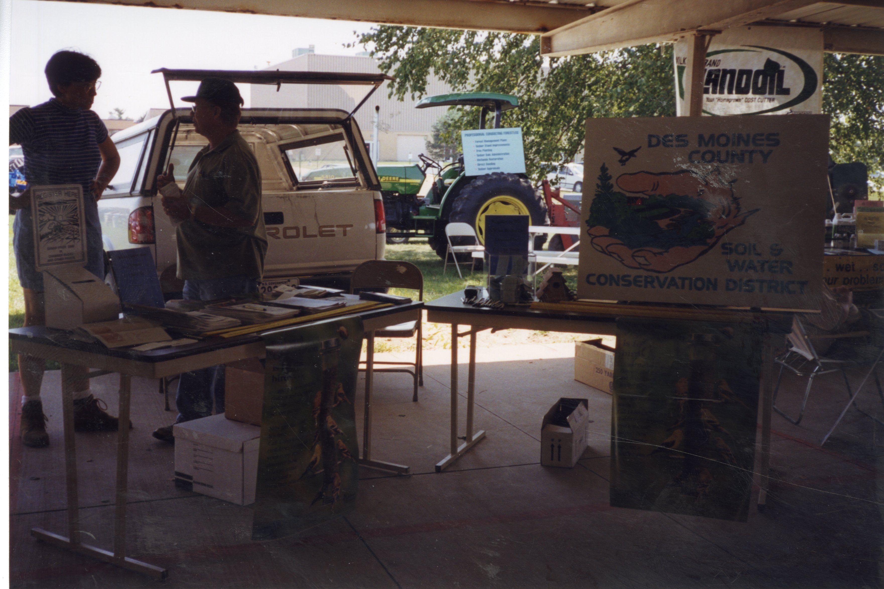 1999  Deb Nace and Ron Snyder at Iowa;Illinois Ag Expo booth