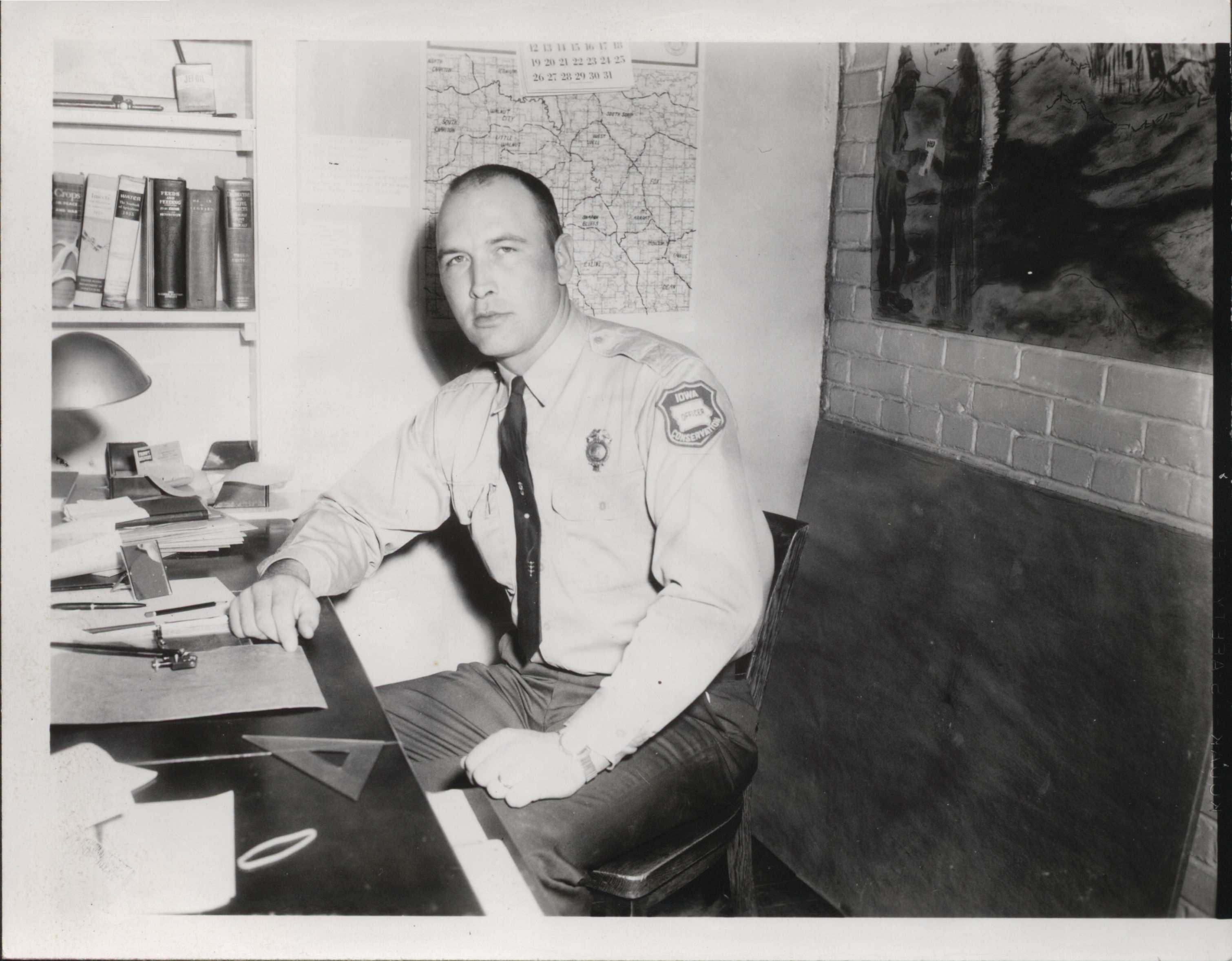 Iowa Conservation Officer.