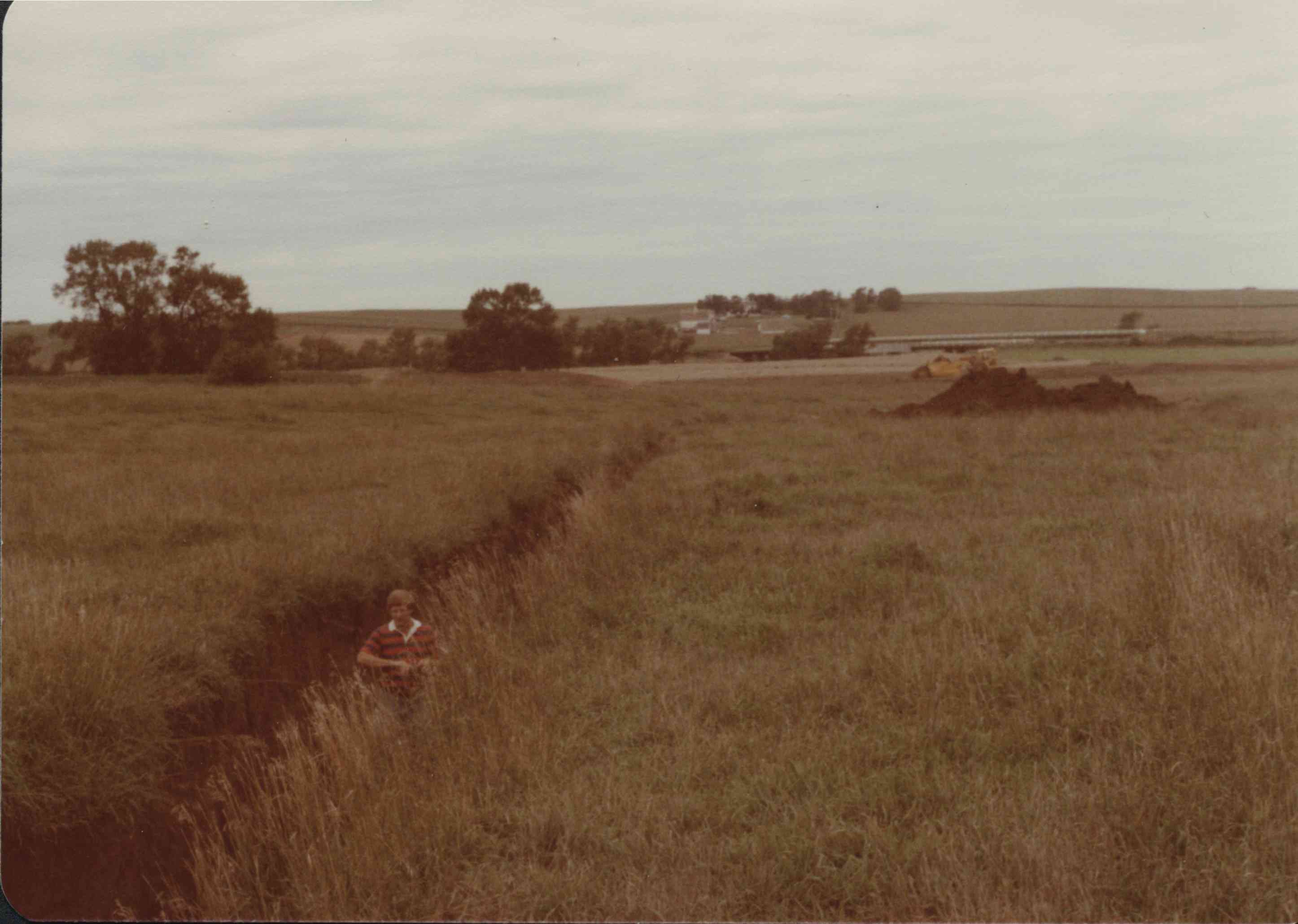 Man Stands in unfinished  Kilker Waterway