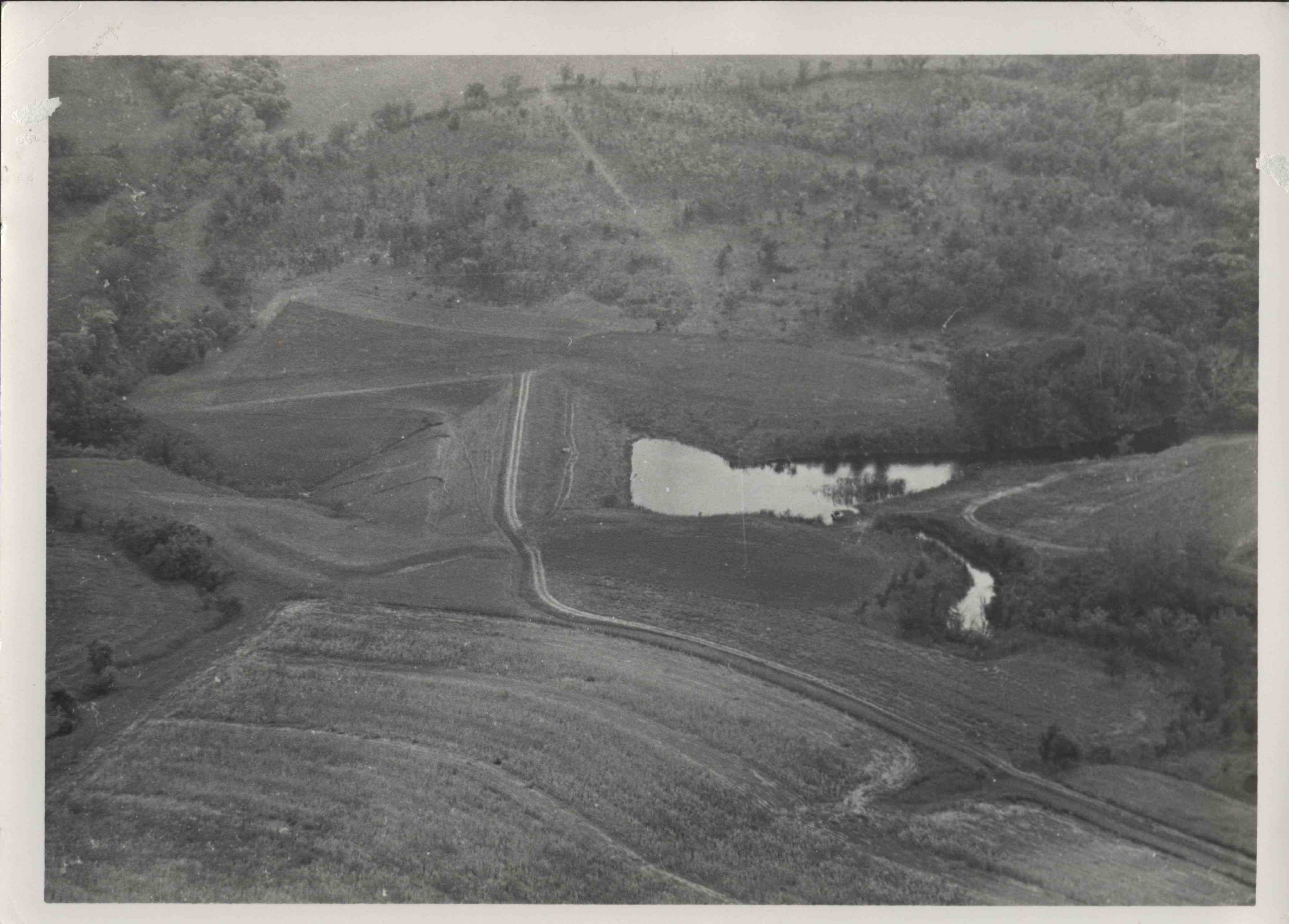 Aerial view of pond and roads on the farm of Virgil Rider