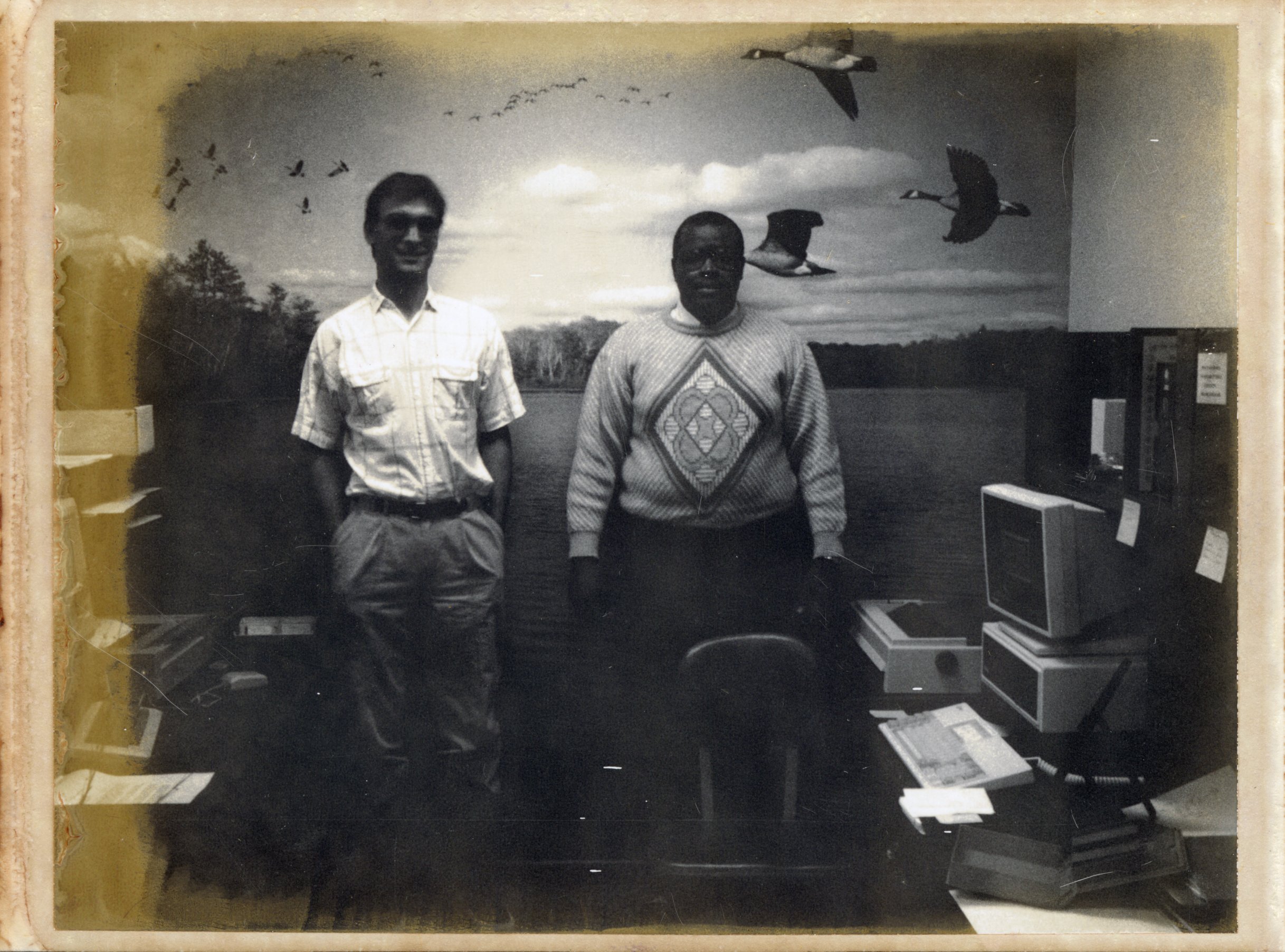1987  Mark Fehseke and Terry Cosby stand for a photo in the offices of the Des Moines County Soil and Water Conservation District
