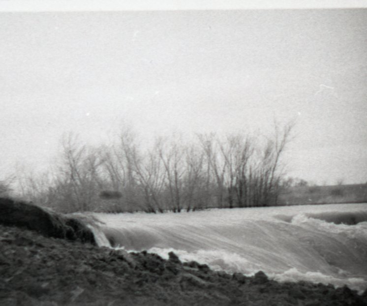 Rushing Flood Water Erodes Land