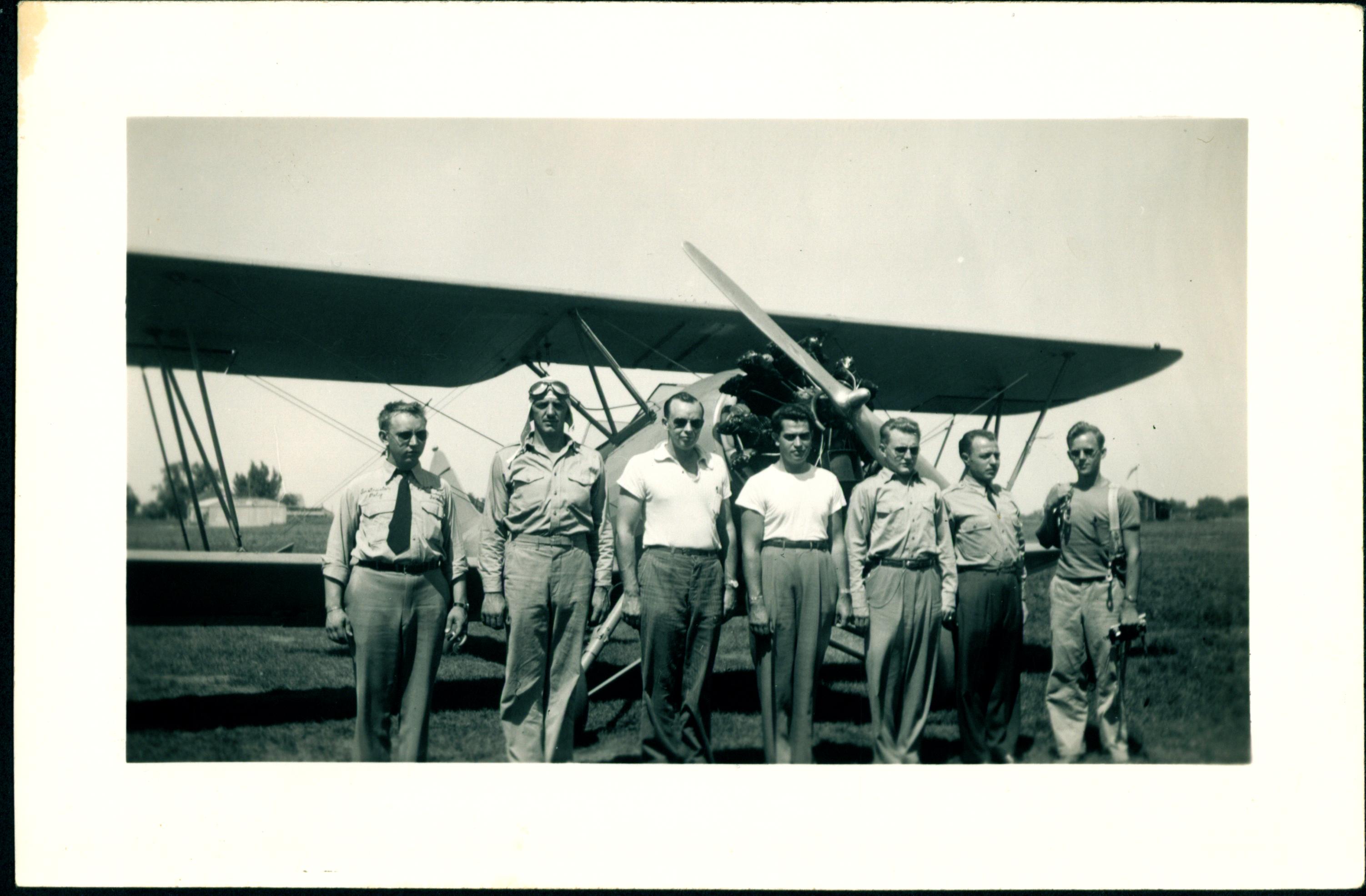 0038_Seven Pilots in front of plane