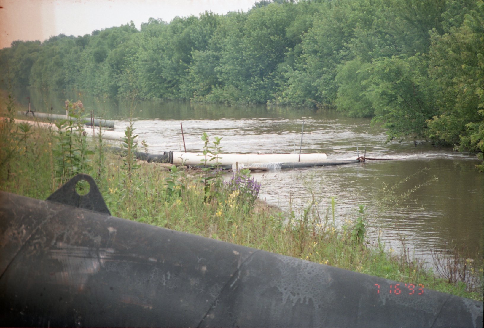 1993 Flood water being piped into the Iowa River