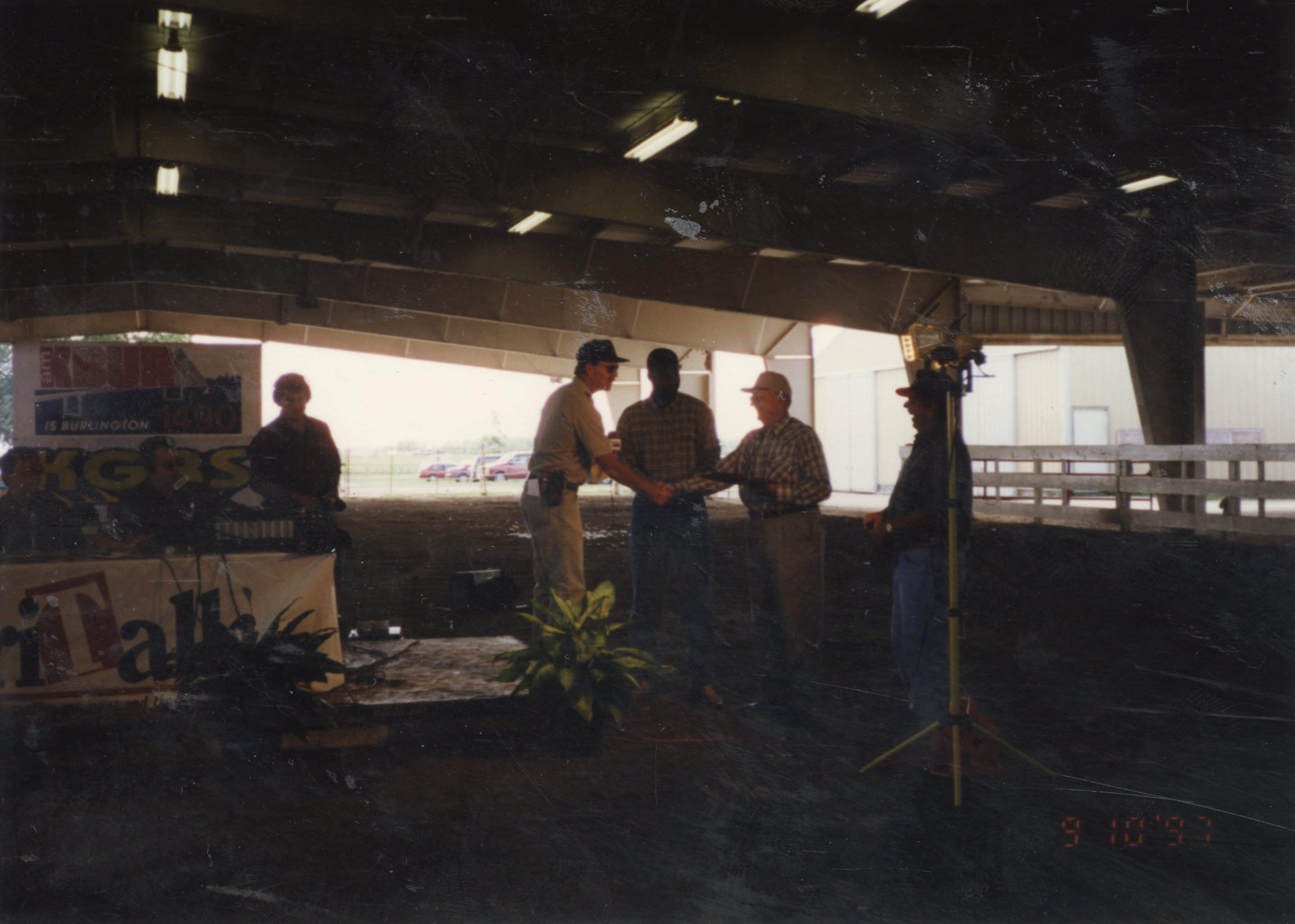 1997  Conservation awards were presented at Ag Expo 97 by  Commissioner Jeff Bergman and Conservationist JB Martin to <br />
Dwight and J.D. Stucker
