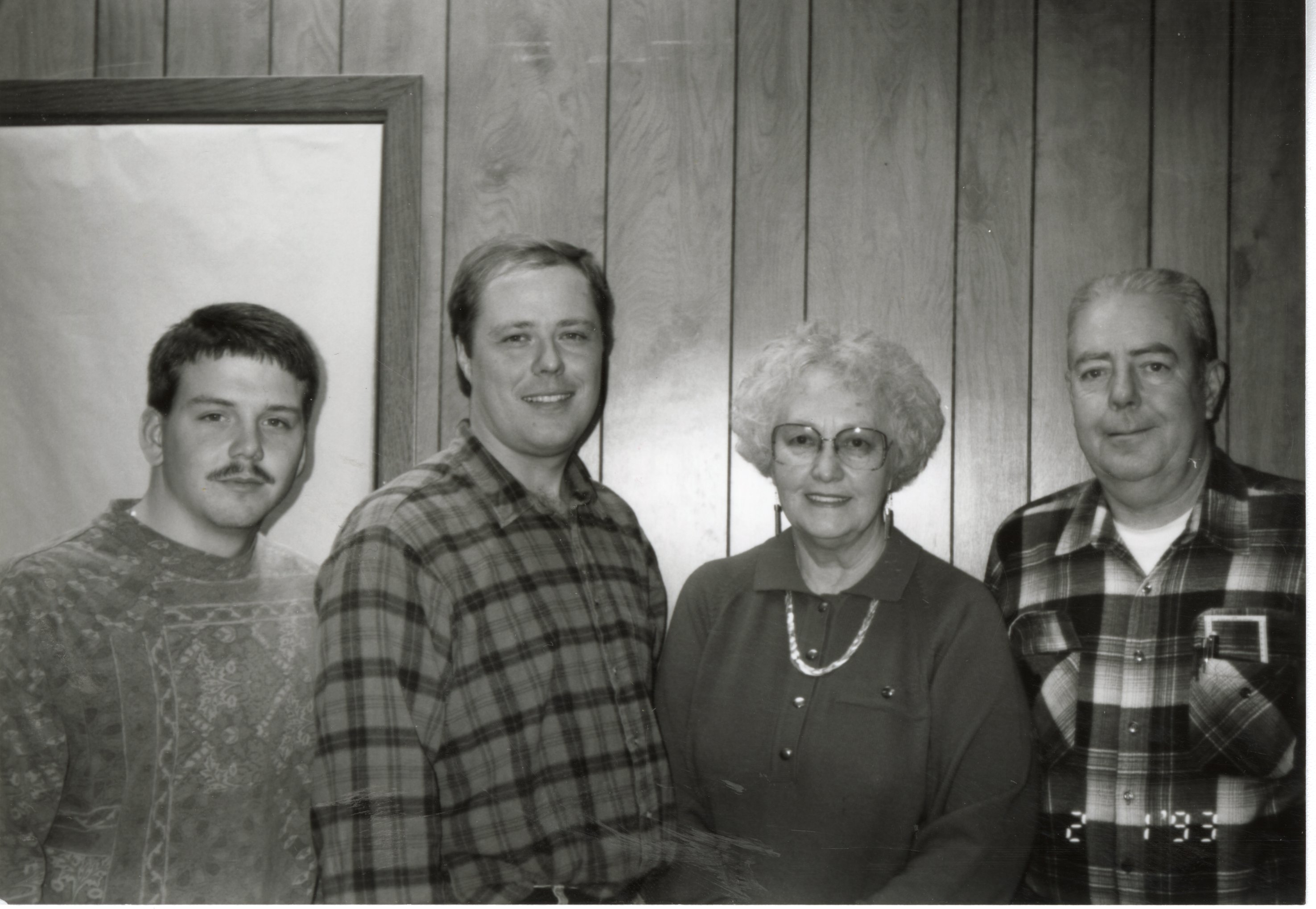 1993  Employees Drew DeLang, Larry Jones, Dorothy Davis, and John Horan