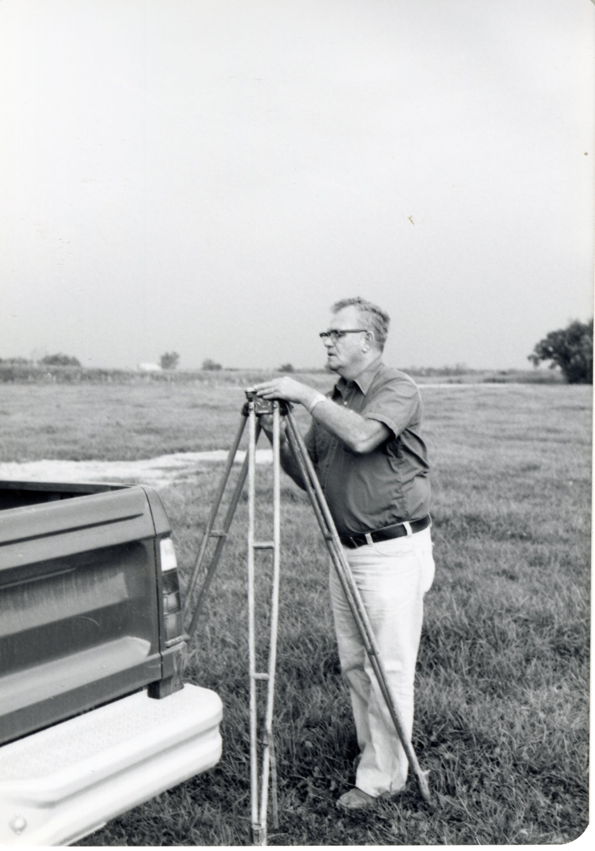 Oren Champ and survey equipment