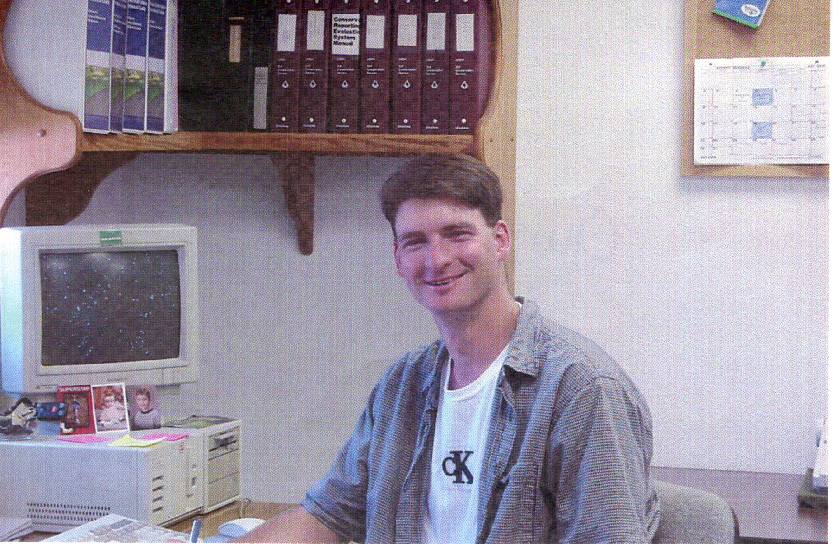 2000  Coop employee Chris Hogge works in the office