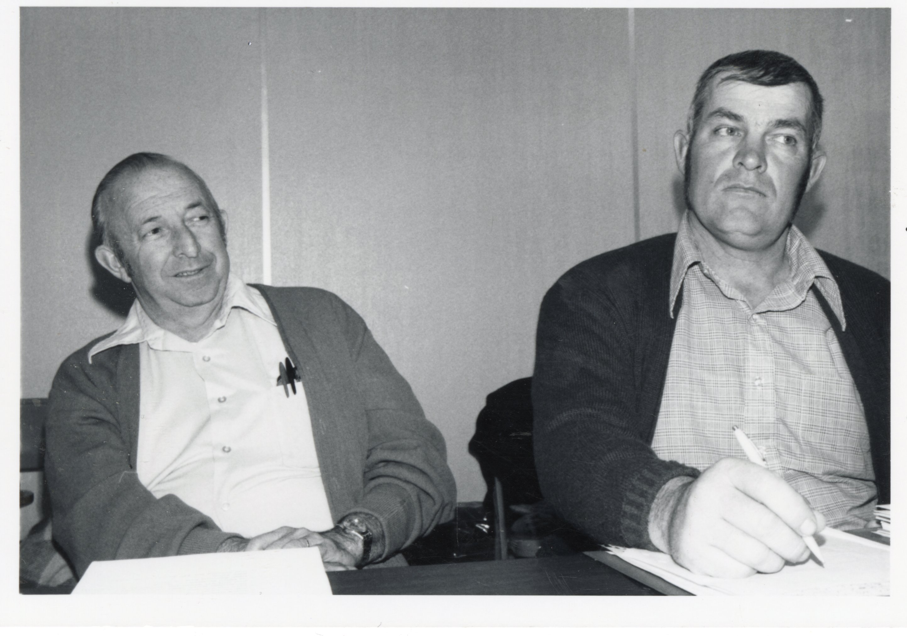 1970s Two men at meeting