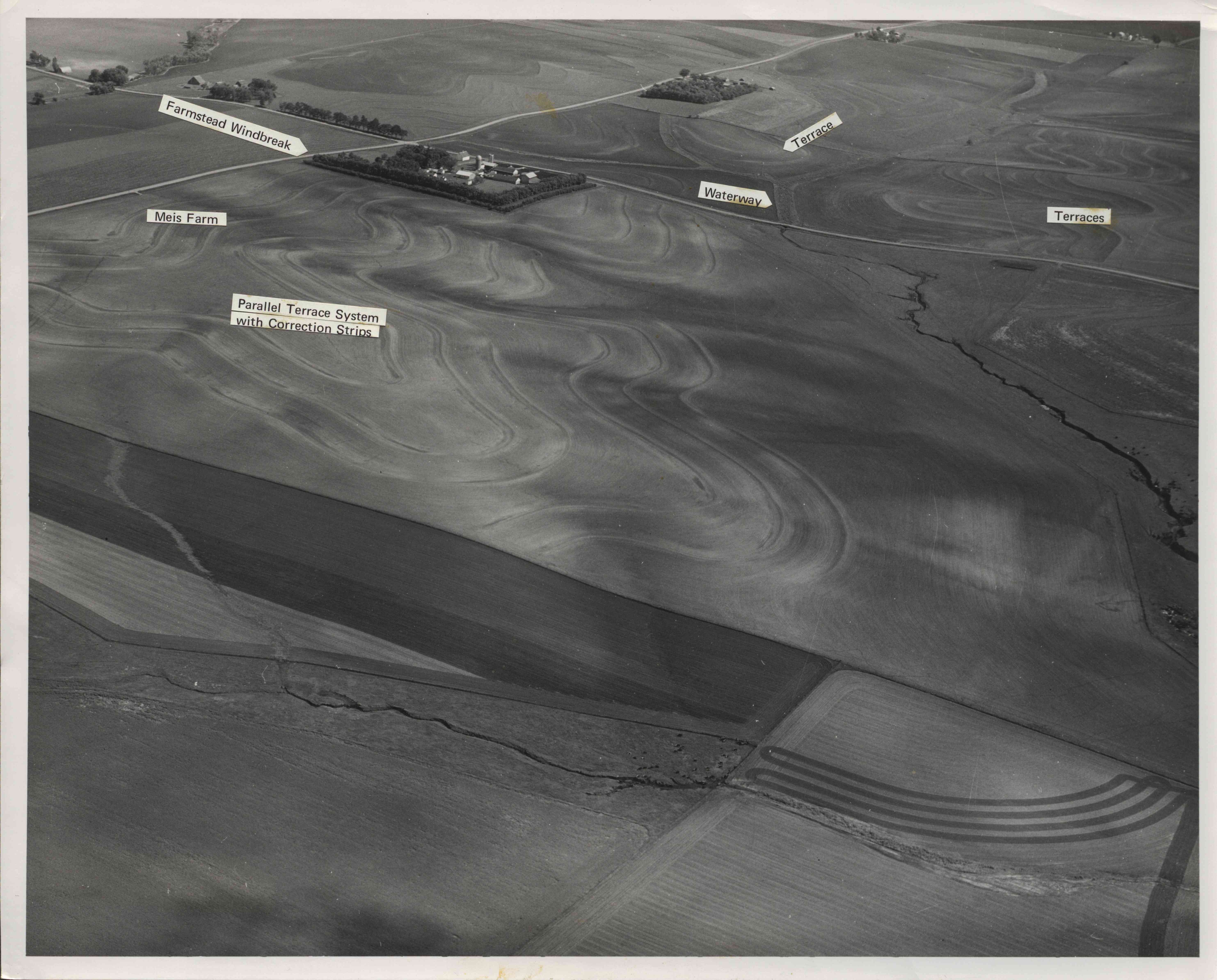 Aerial view of farm land showing terraces, waterways and windbreaks on the Meis farm