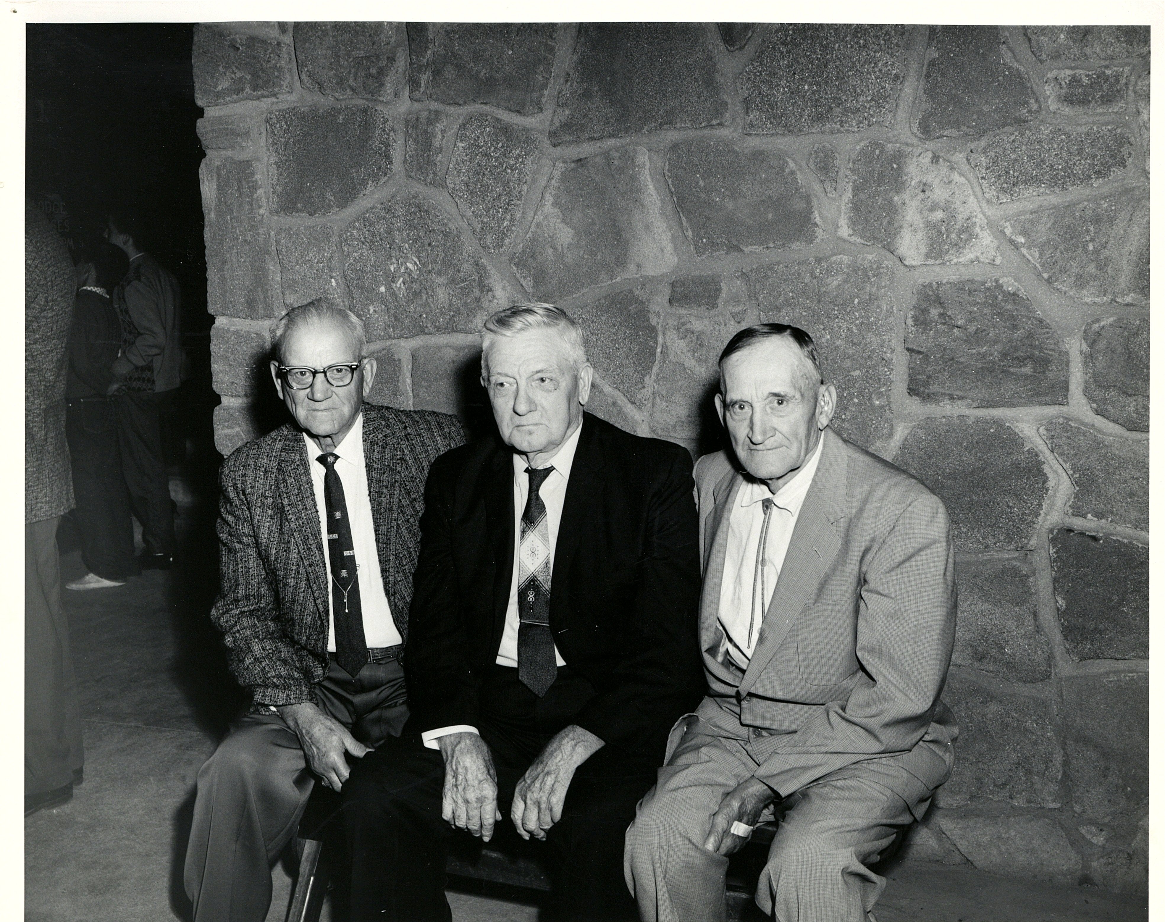Three men on bench