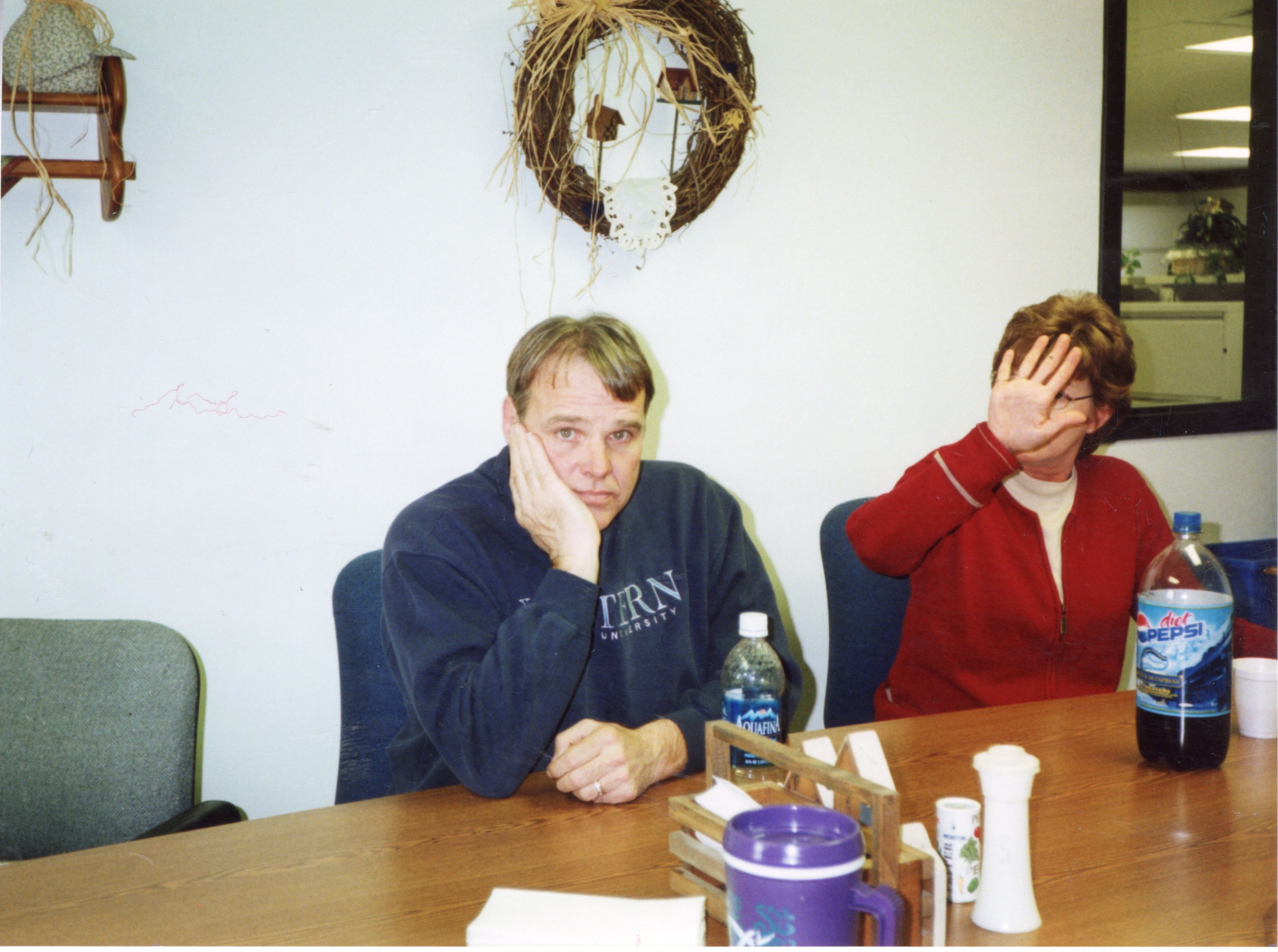 2005  District Employee Dale Schmeiser and FSA Employee Deb Kennedy sit at a table