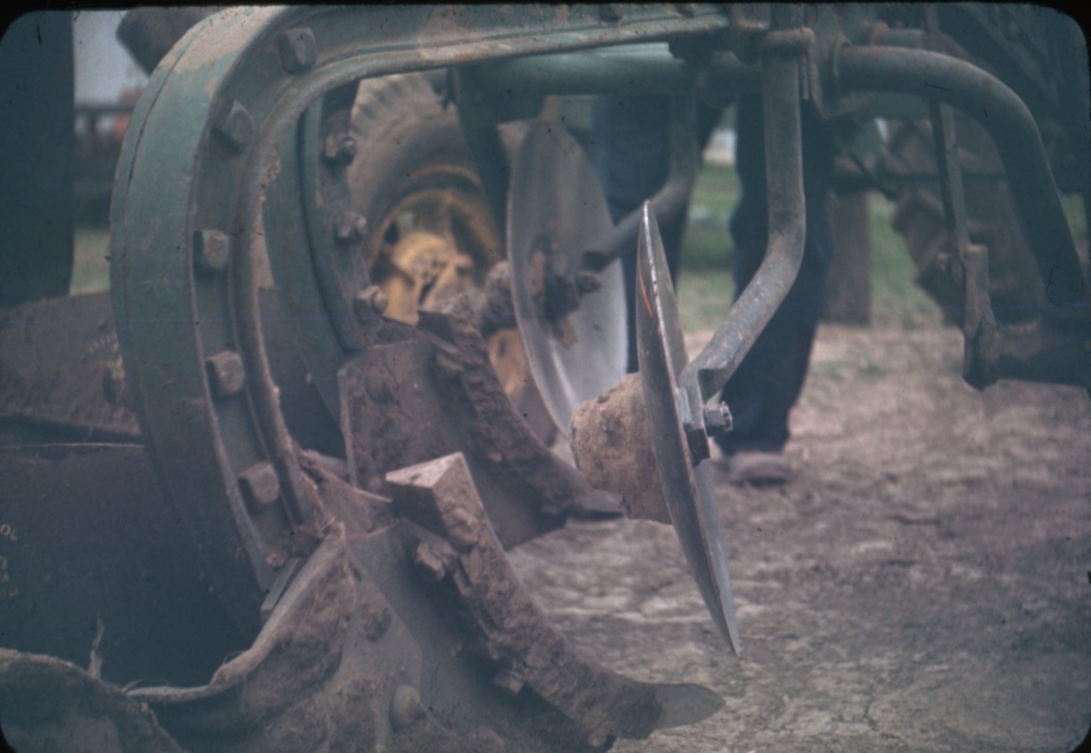 Rear view of disc coulter on Leland McCosh farm, 1946