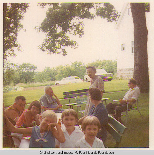 Heitzmans seated at bench