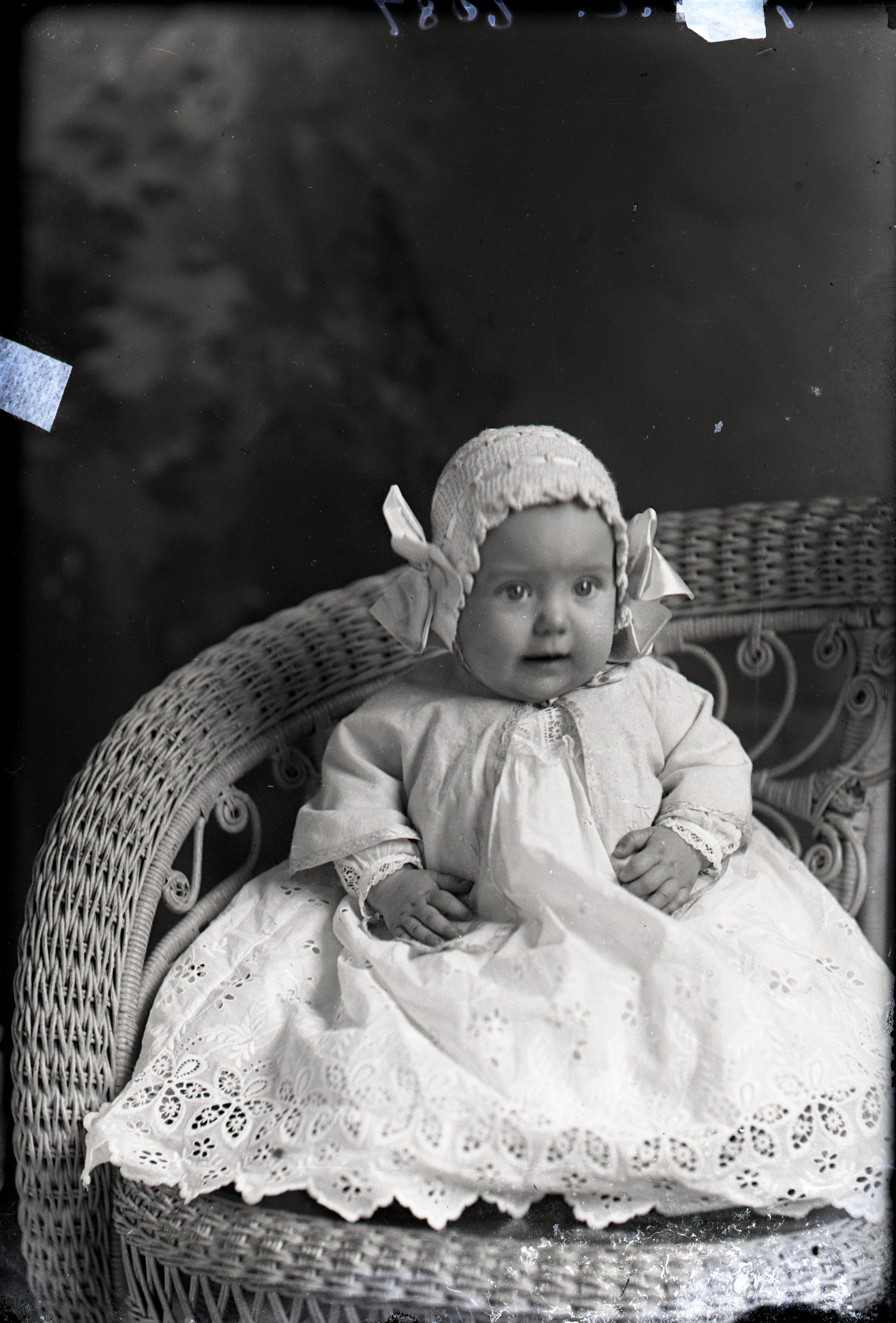 Infant in bonnet