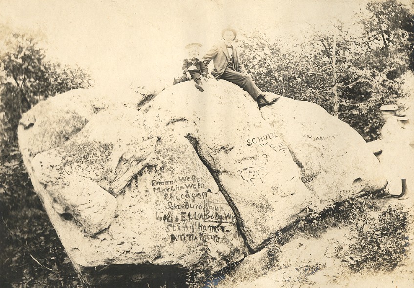 Man & Child on Large Rock 