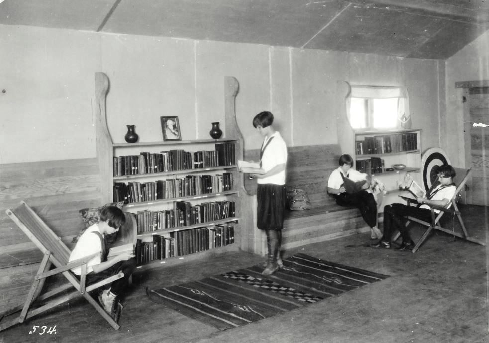 Children reading at a library extension site.