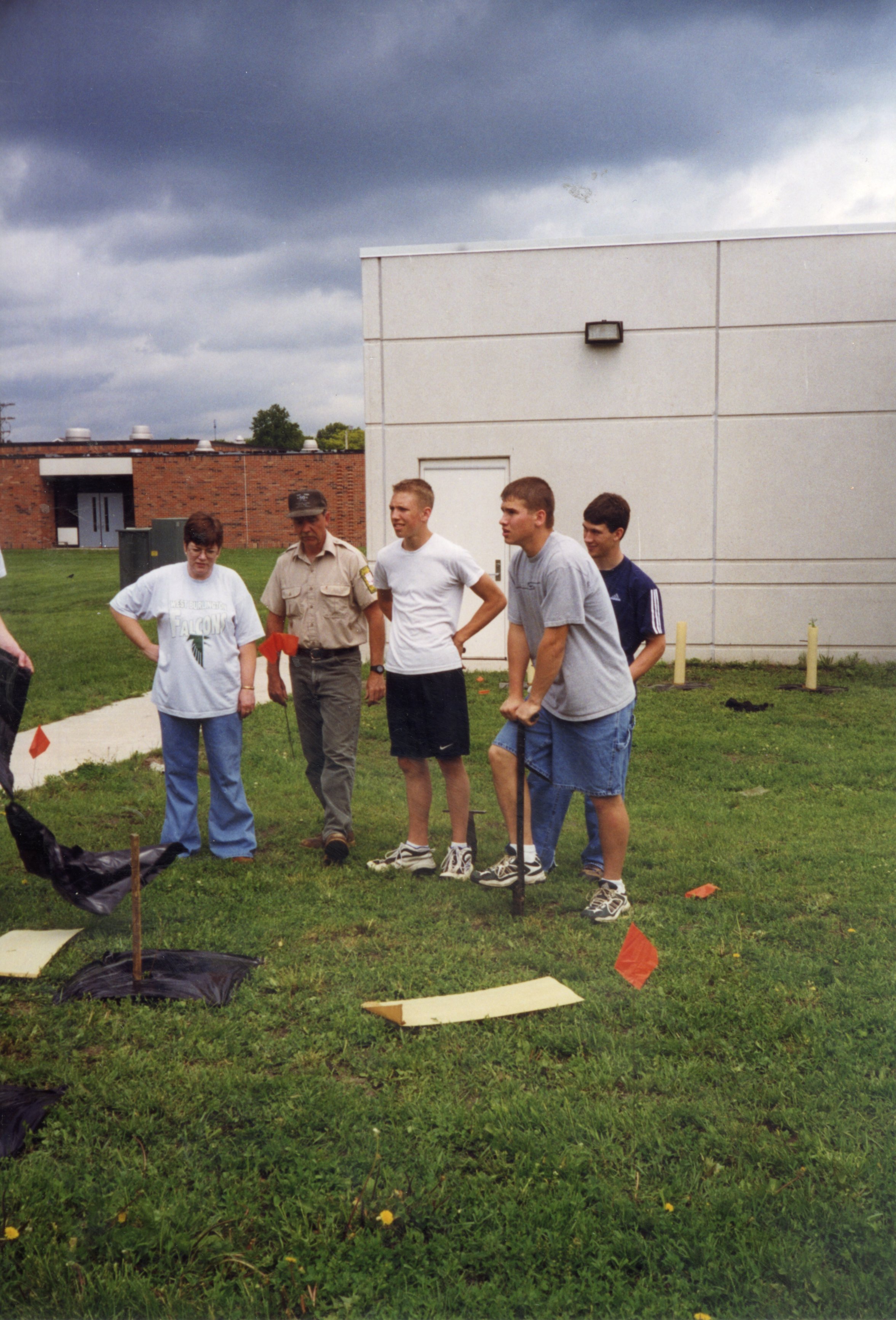 1999 Four students learning tree planting