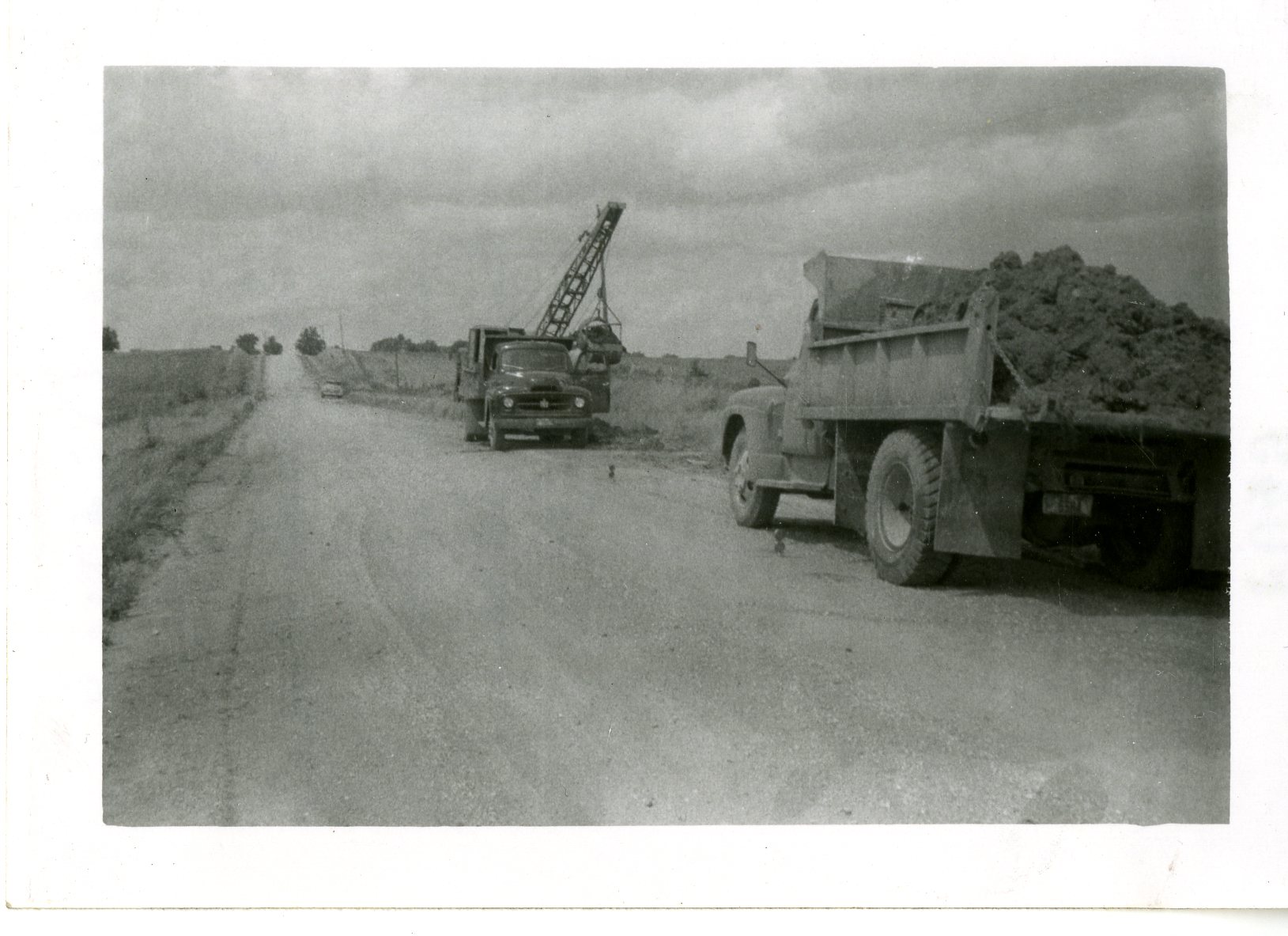County Trucks Clearing Road, 1958