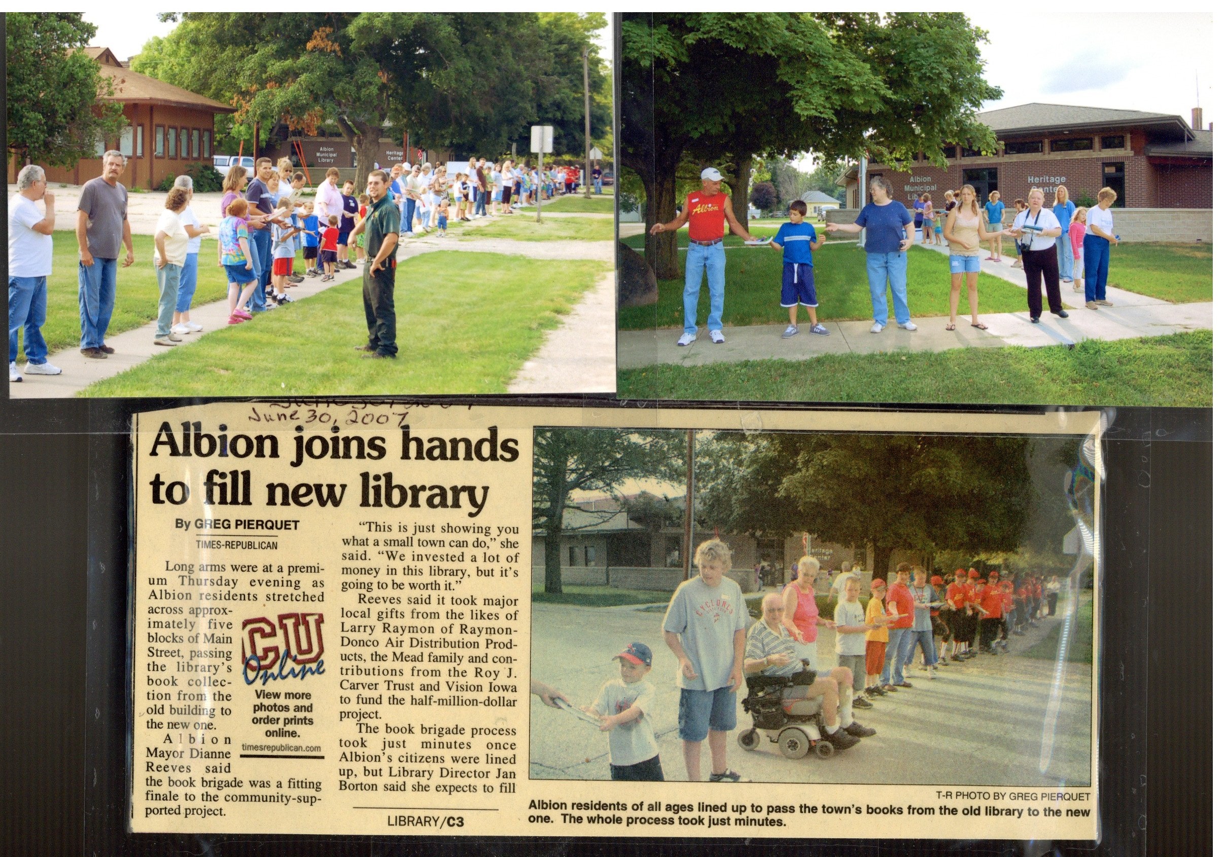 June 30, 2007 Article and photo of book pass to new library