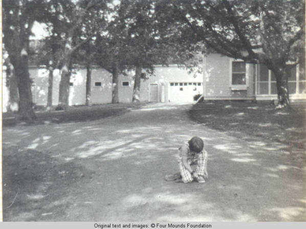 John, Jr. crouching on lane