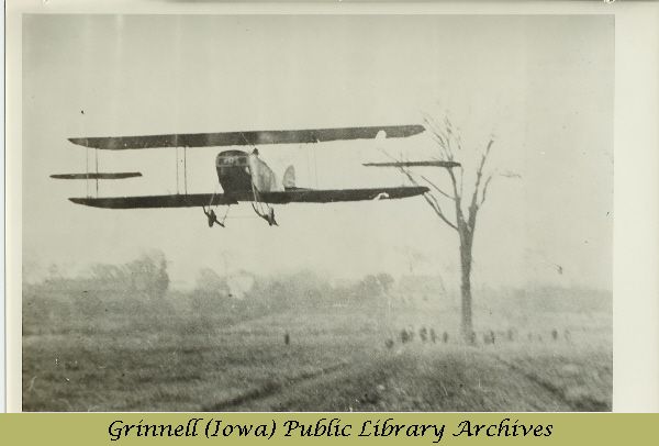 Billy Robinson flying biplane