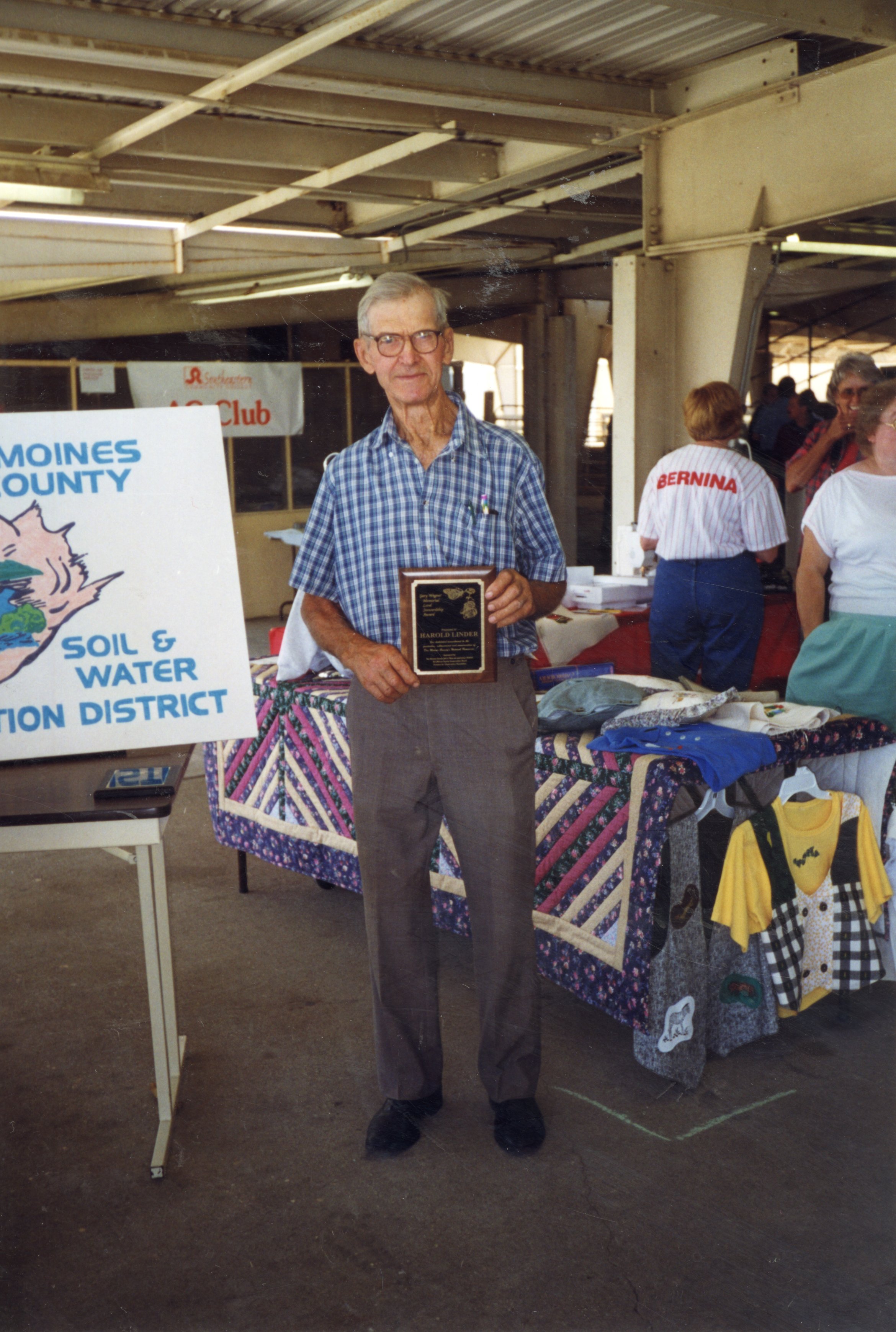 1998  Harold Linder stands holding a plaque as the winner of the first Gary Wagner Memorial Stewardship Award