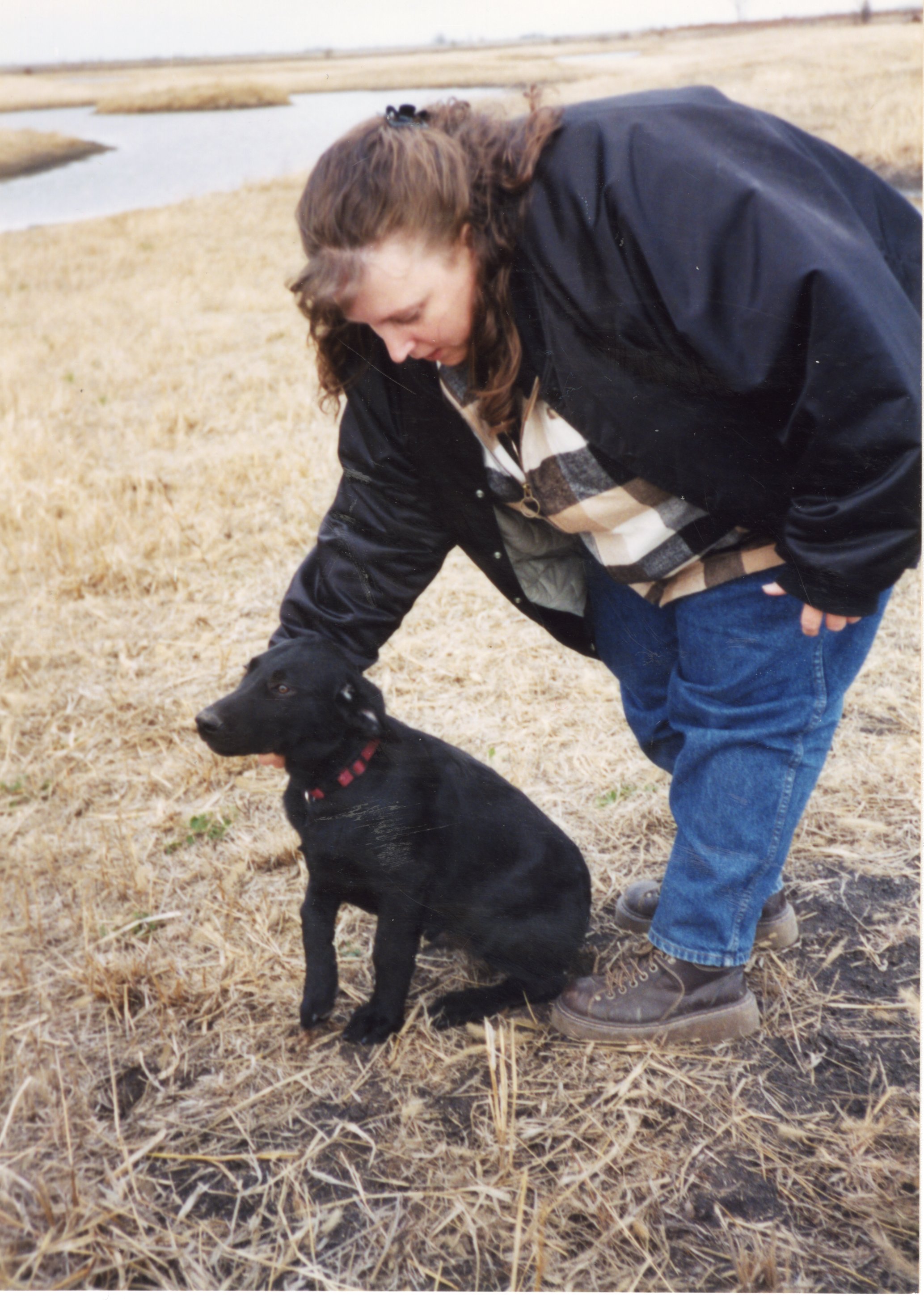 2002   Charles Poisel's dog, Bud, and State Secretary Jamie Grimes 