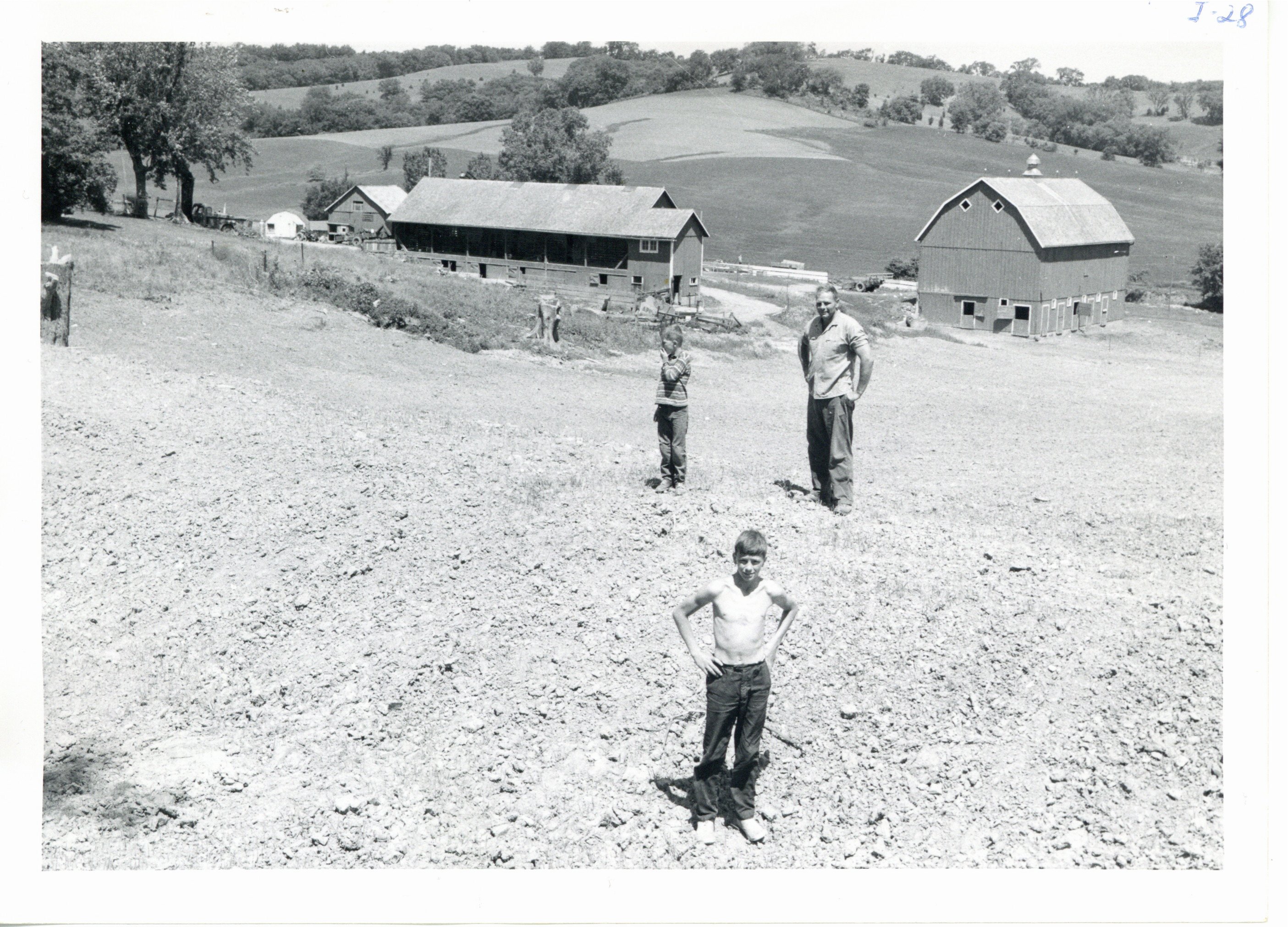 Milton Kettman newly constructed spring fed farm pond, 1965