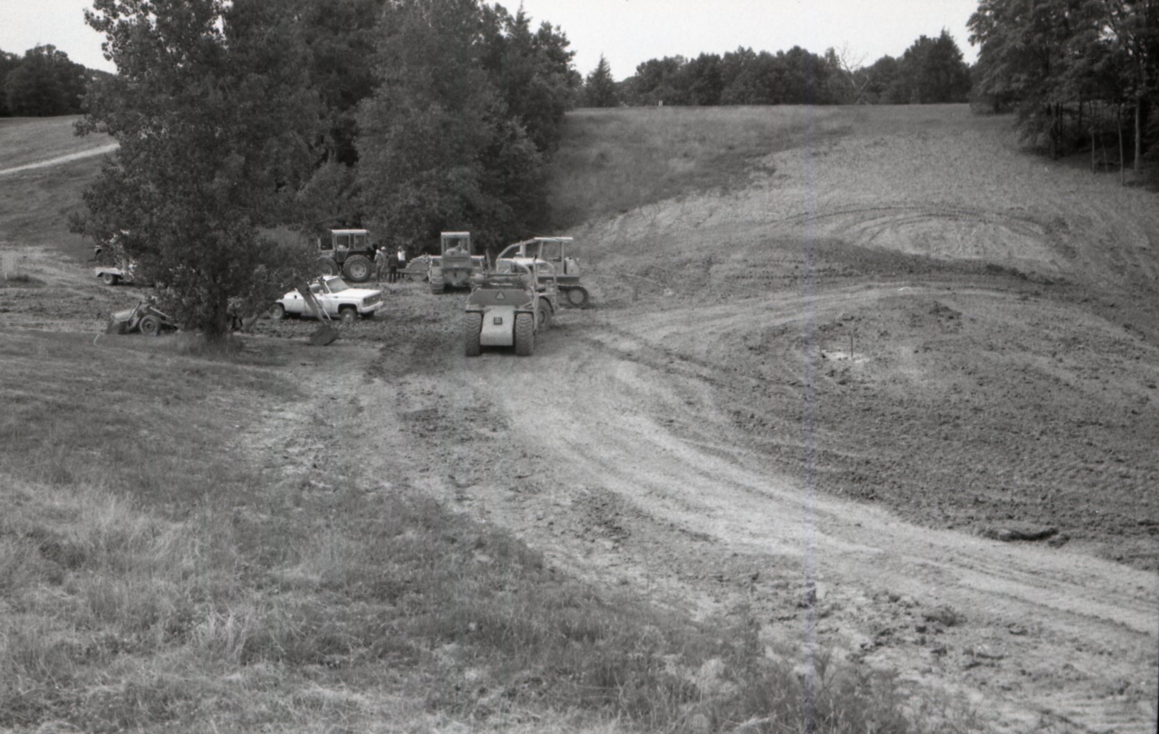 1970's Grassy field with machinery