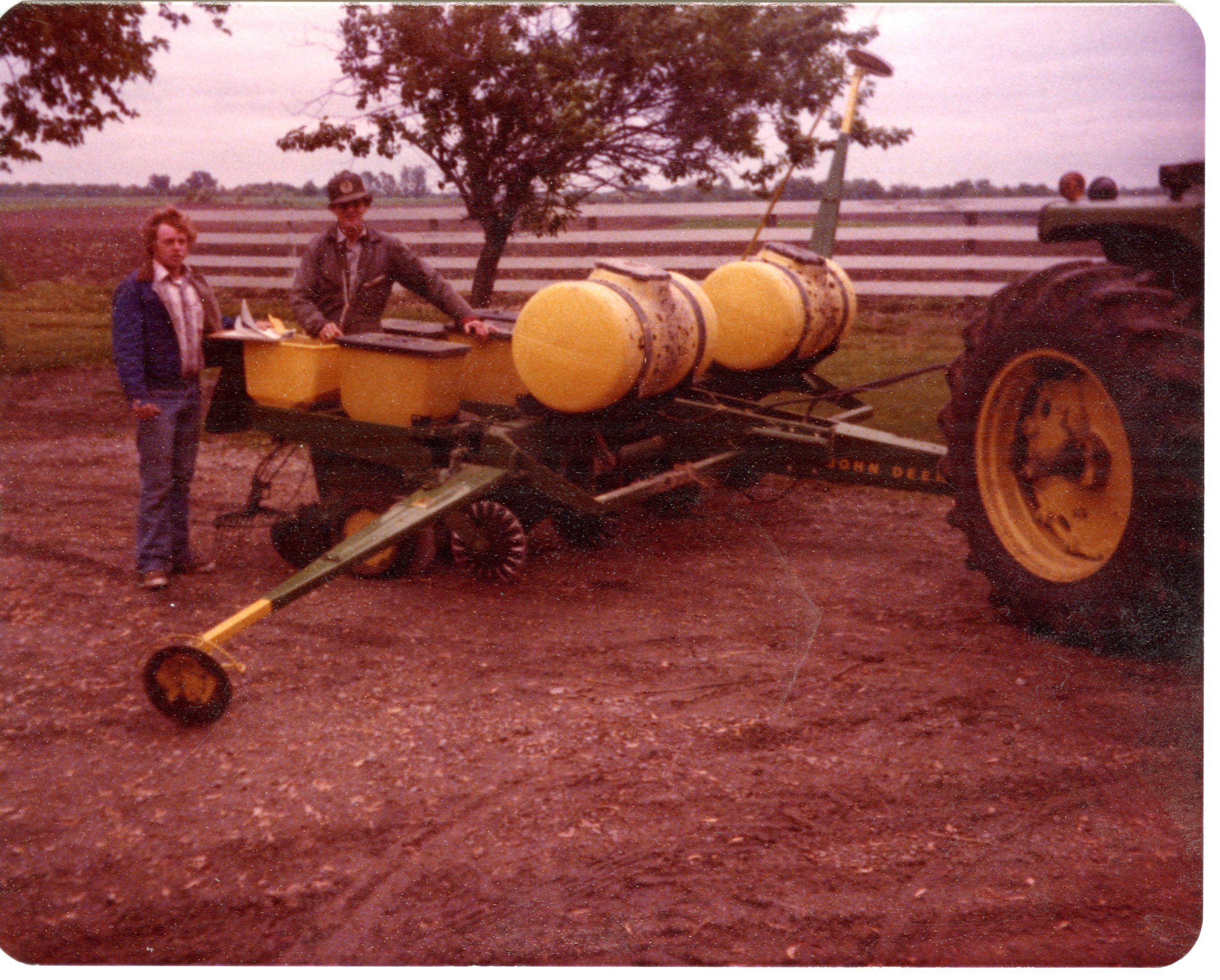 Loren Cassel and Bill Smith Stand by Planter
