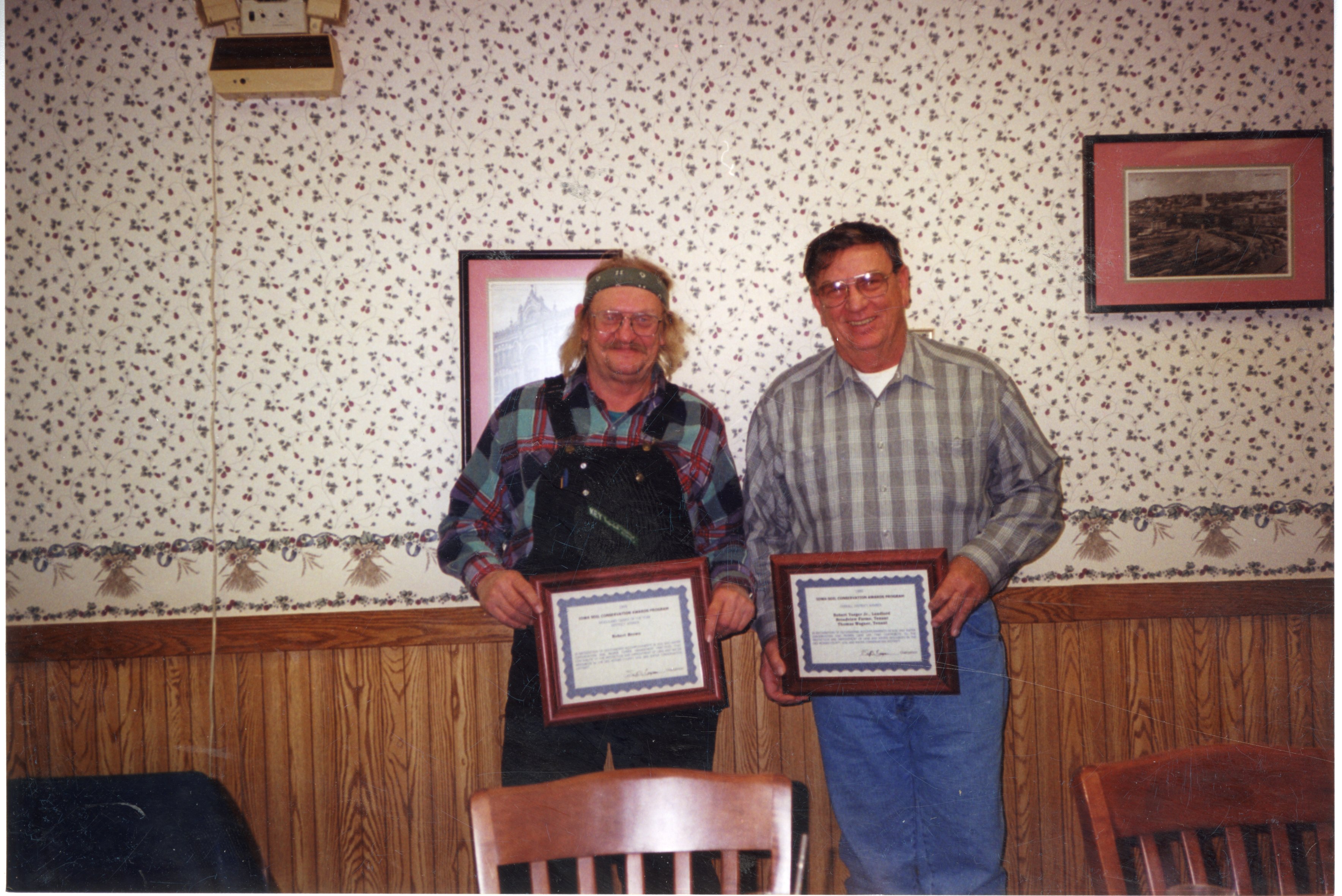 2000 - Robert Brown and J.D. Stucker receive awards at the Country Kitchen in Burlington, Iowa