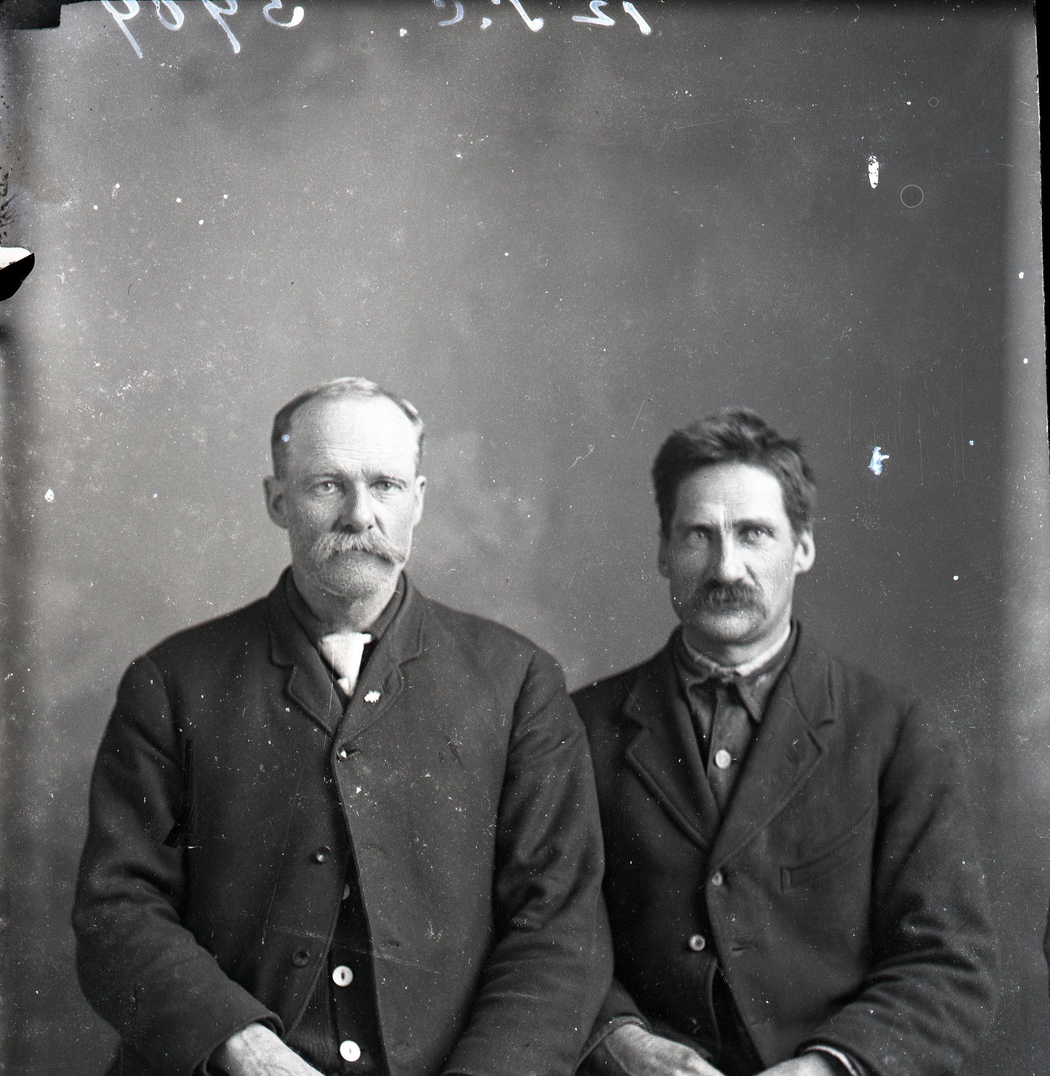 Two men seated