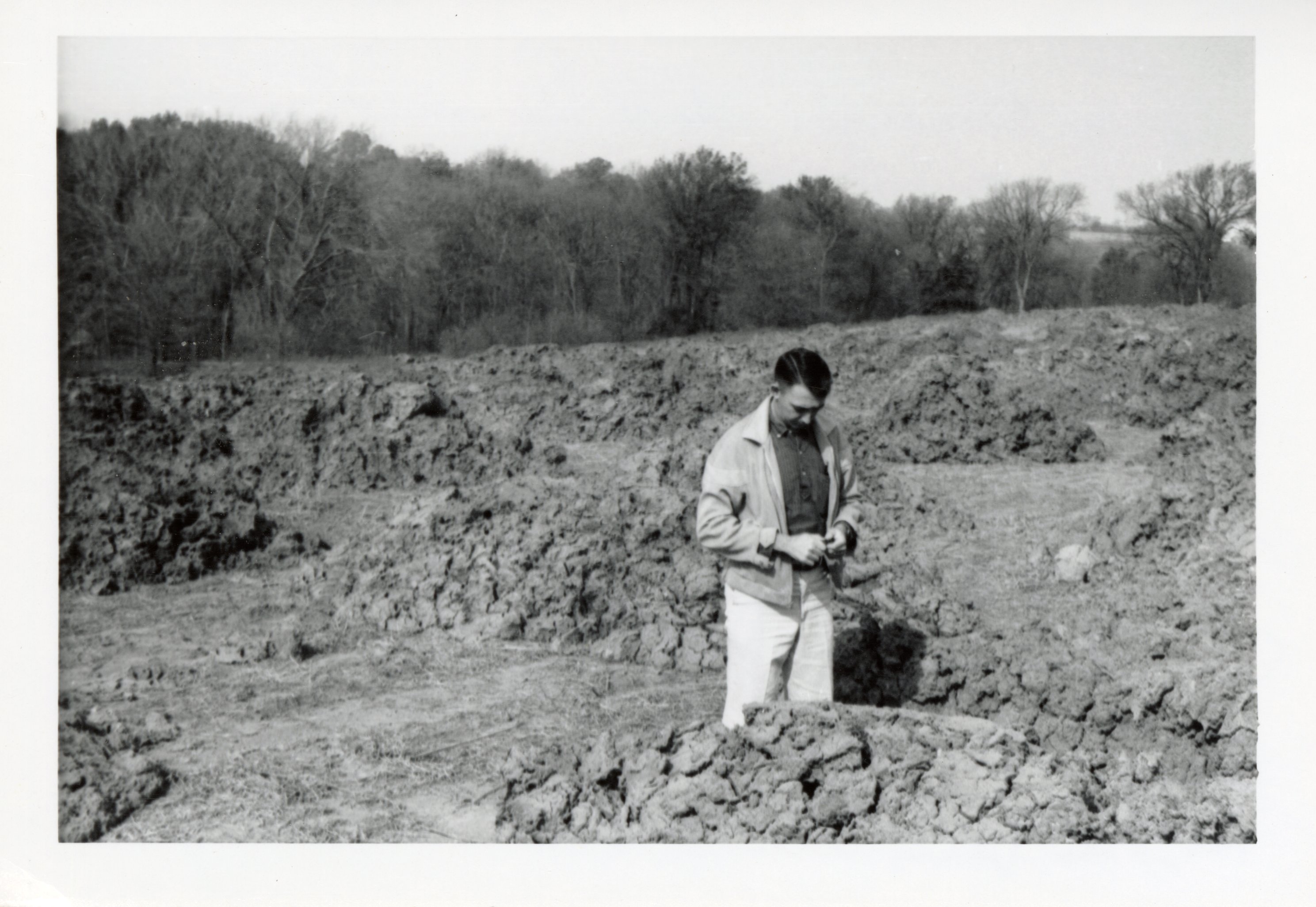 Ed McDonough Stands by Loads of Silt