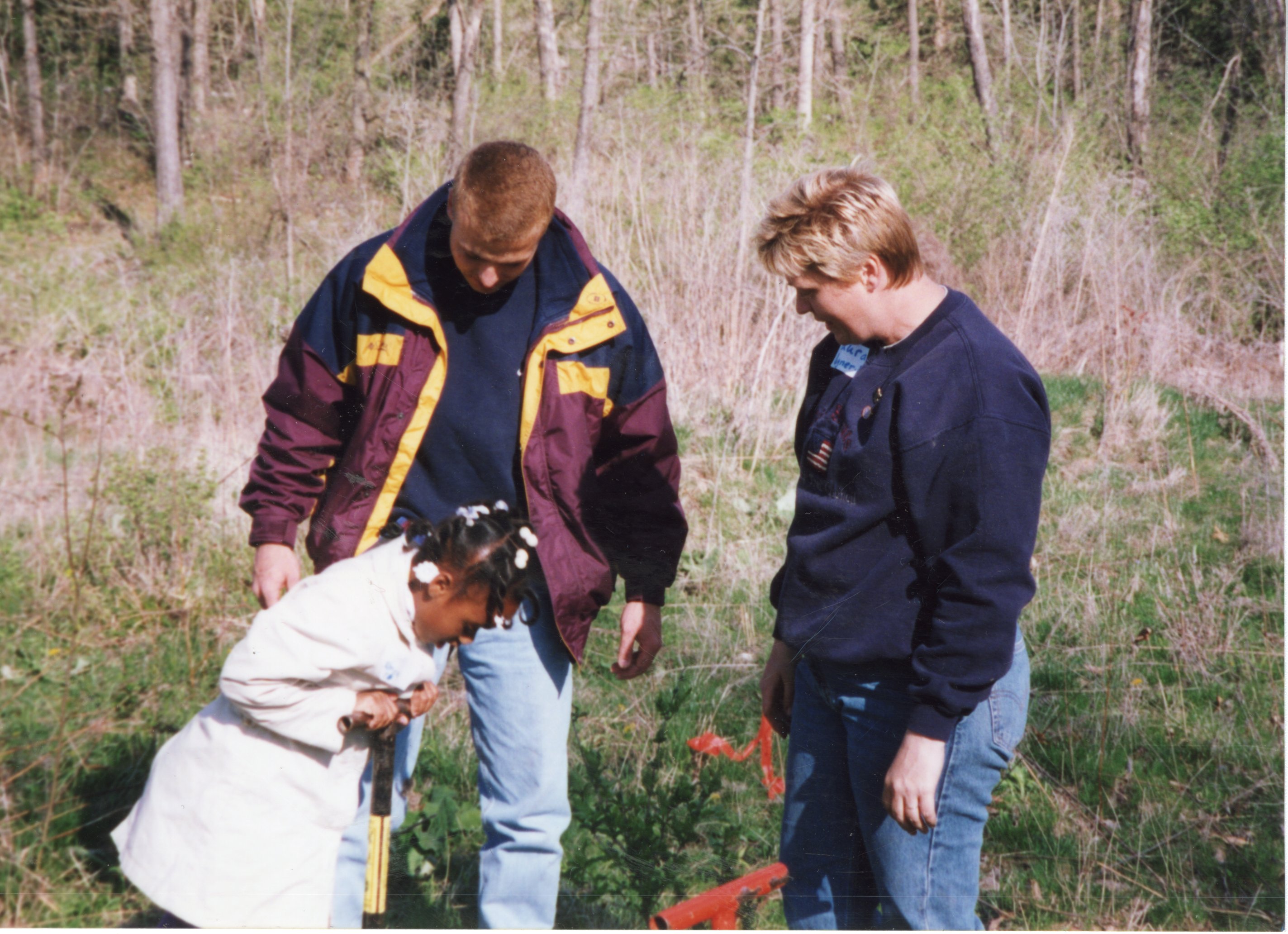 2002  Soil Conservationist Troy Deutmeyer helps girl scouts plant trees
