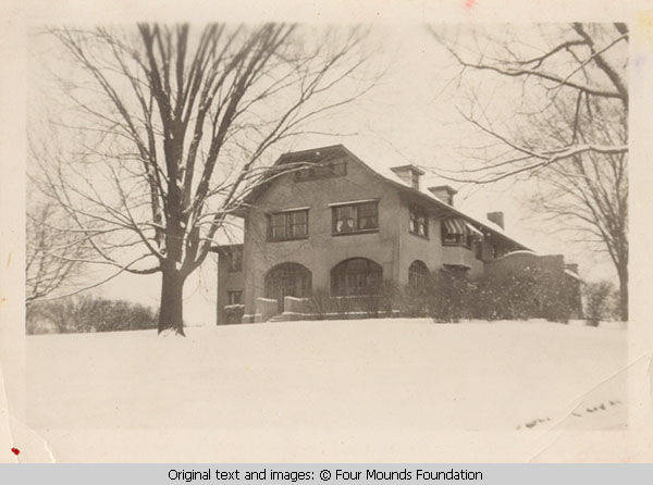 Grey house side entrance in winter