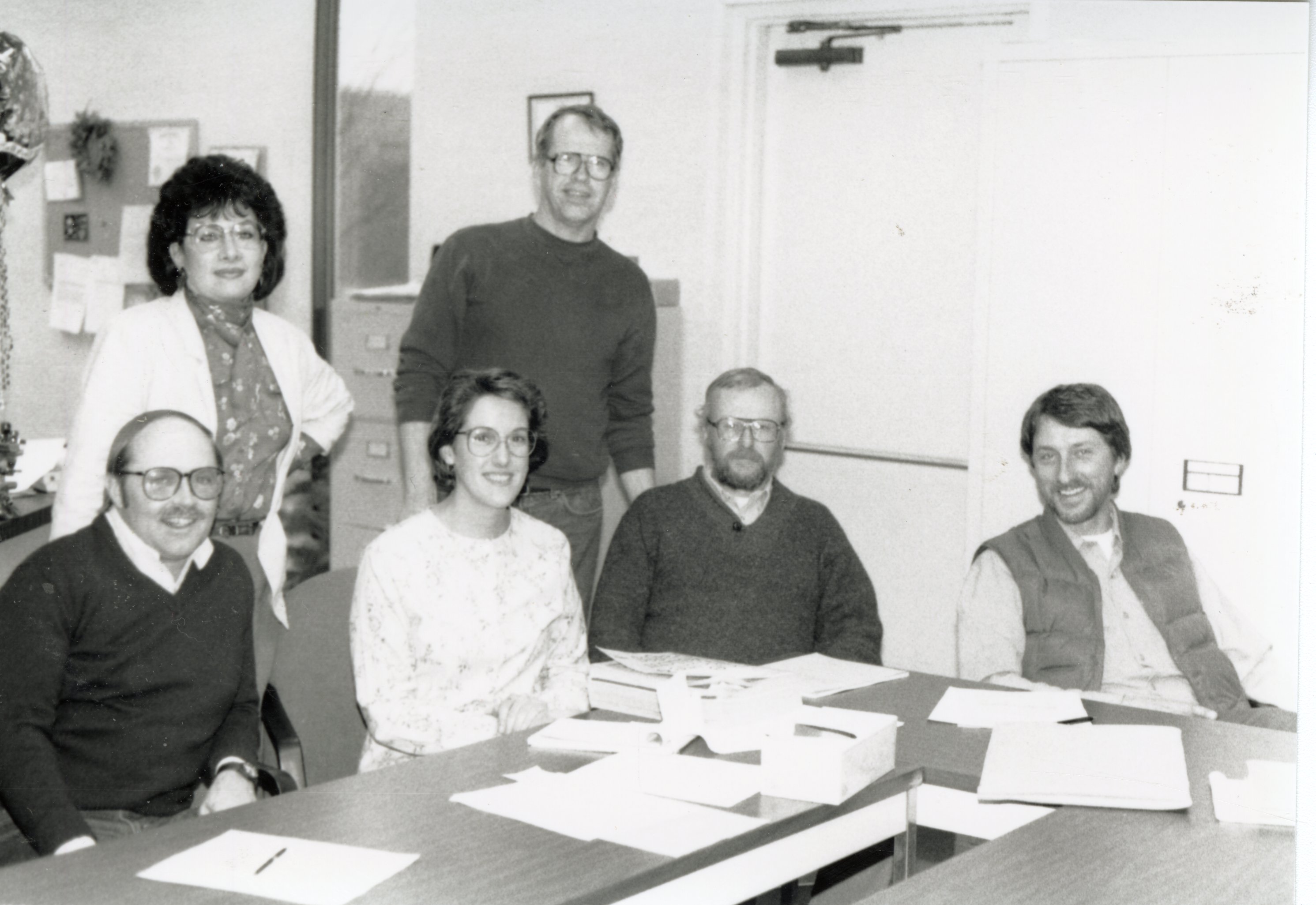 Six unidentified office workers
