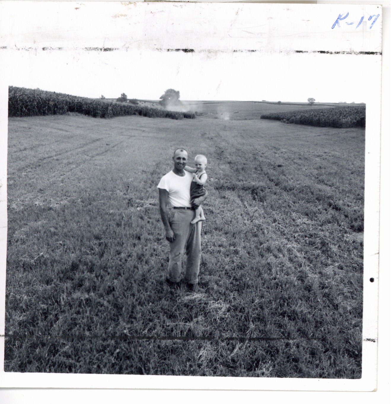 Gene Stillmunkes and child, 1964