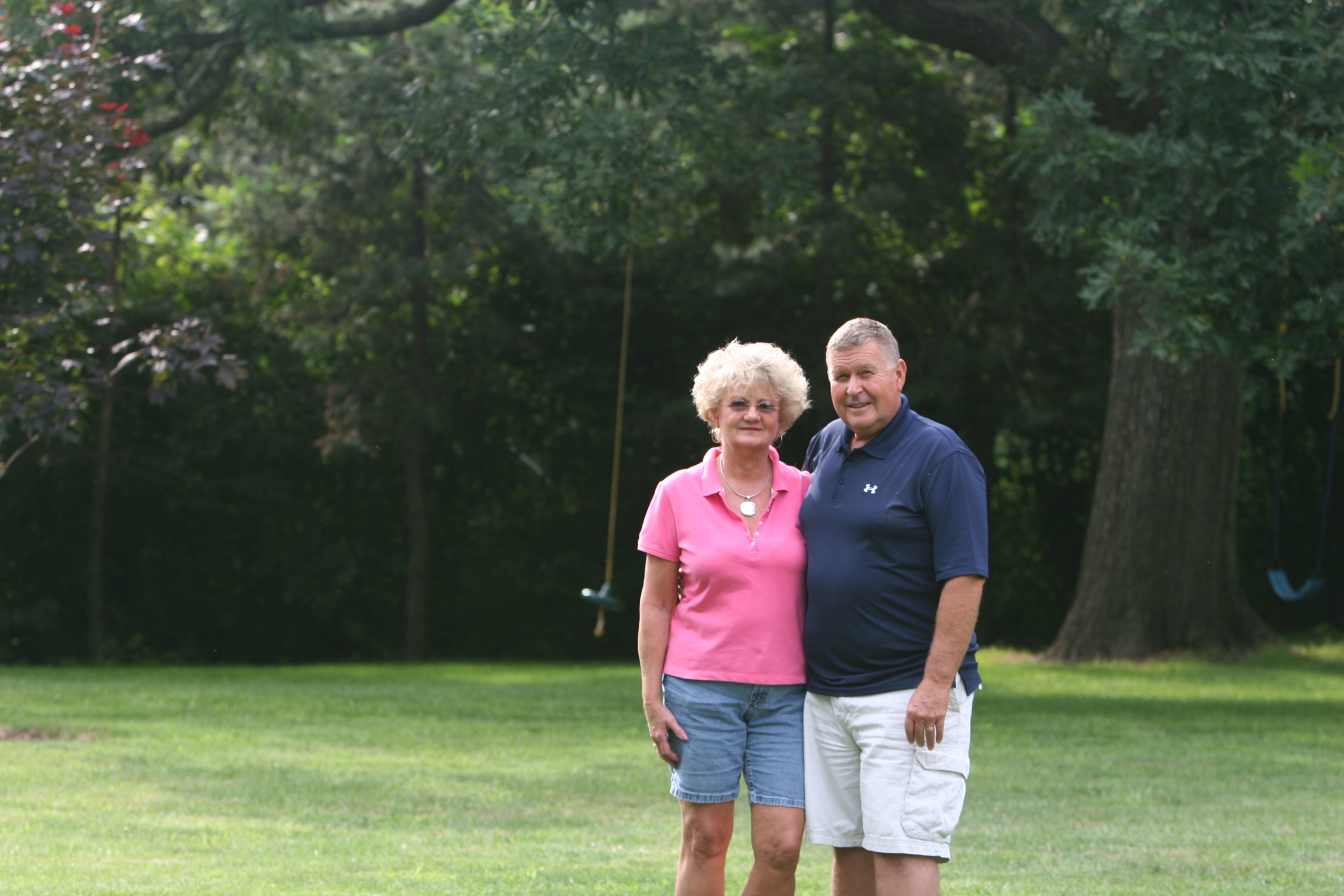 Unidentified couple with windbreak background