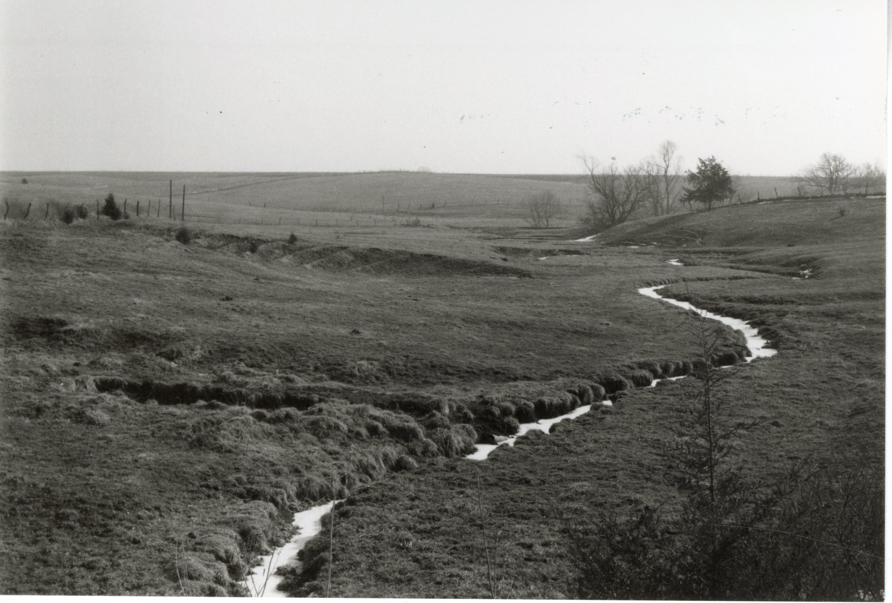 Stream running down eroded area