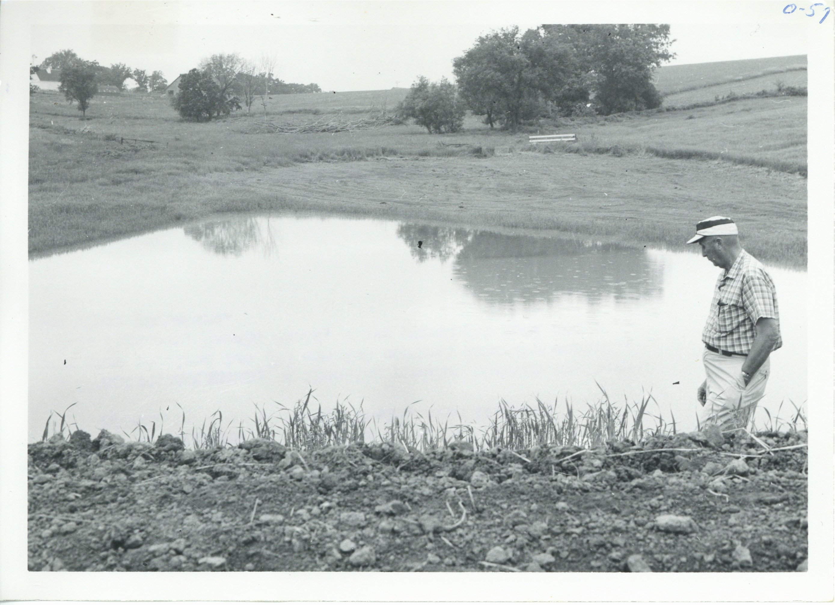 Harold Shold at Marshall farm pond, 1967