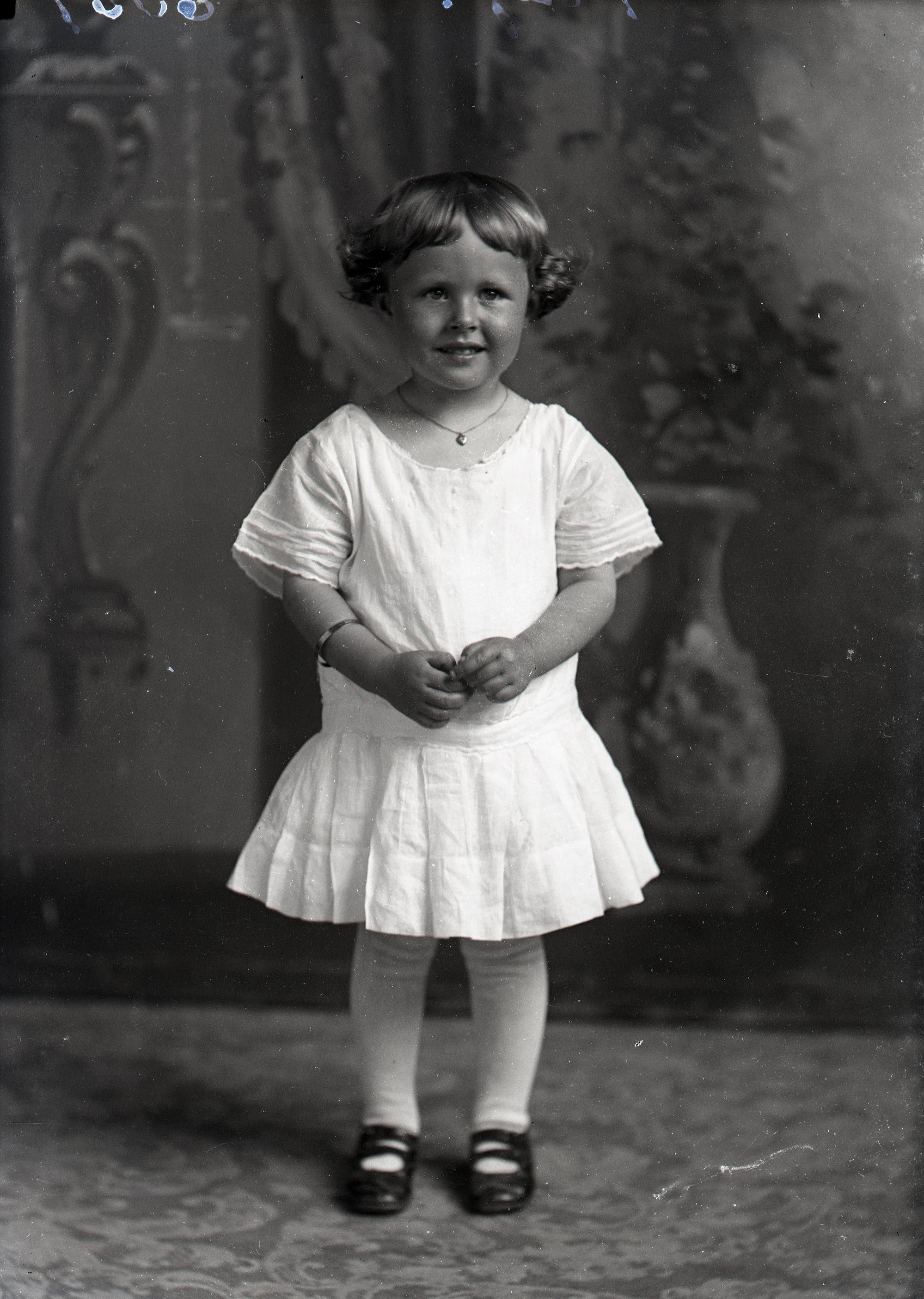 Child in white dress