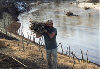 1999  Geode RC&D Employee Eric Japsen carries branches